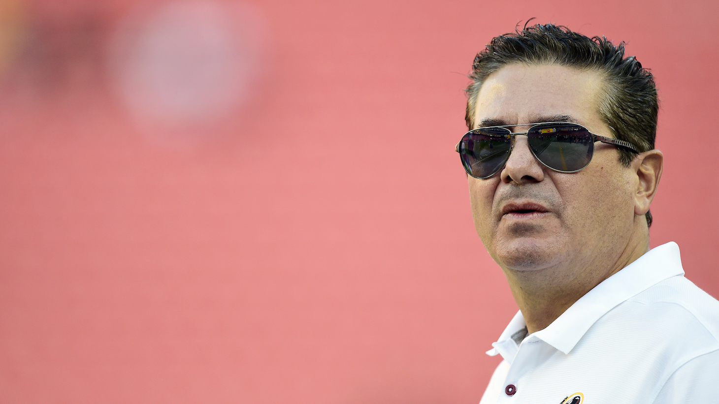 LANDOVER, MD - AUGUST 29: Washington Redskins owner Dan Snyder stands on the field before a preseason game between the Baltimore Ravens and Redskins at FedExField on August 29, 2019 in Landover, Maryland. (Photo by Patrick McDermott/Getty Images)