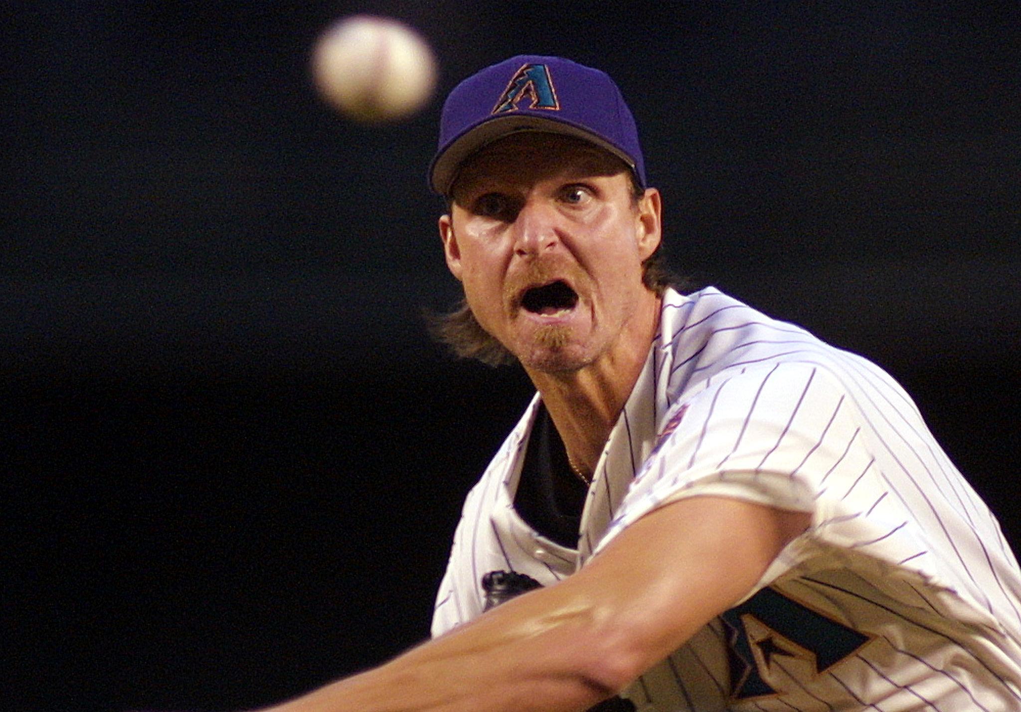 Arizona Diamondbacks starter Randy Johnson pitches against the Florida Marlins during the second inning 23 April 2001 in Phoenix. AFP Photo/Mike FIALA (Photo by Mike FIALA / AFP) (Photo by MIKE FIALA/AFP via Getty Images)