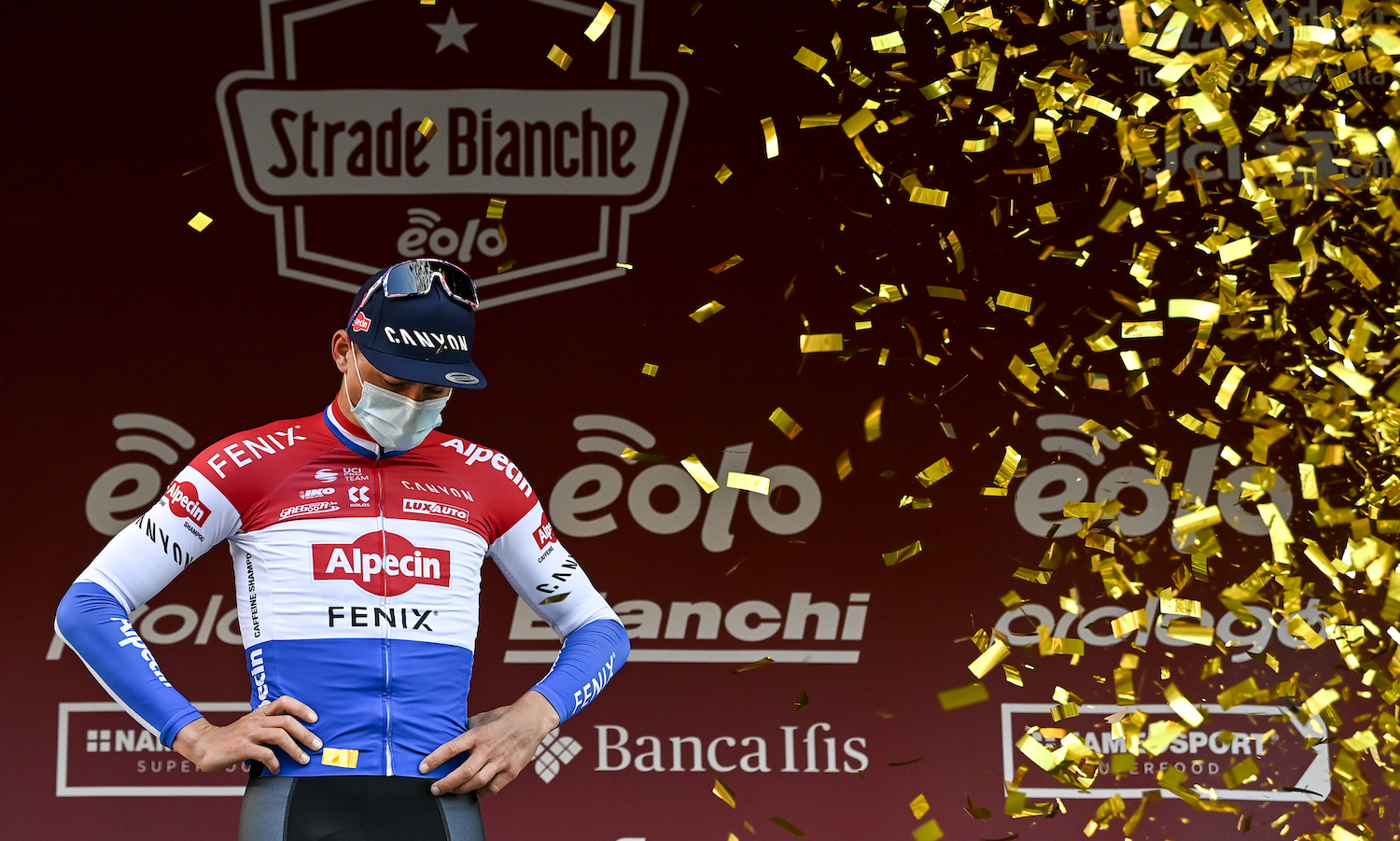 Dutch Mathieu van der Poel of Alpecin-Fenix celebrates on the podium after winning the 'Strade Bianche' one day cycling race (184km) from and to Siena, Italy, Saturday 06 March 2021. BELGA PHOTO DIRK WAEM (Photo by DIRK WAEM/BELGA MAG/AFP via Getty Images)