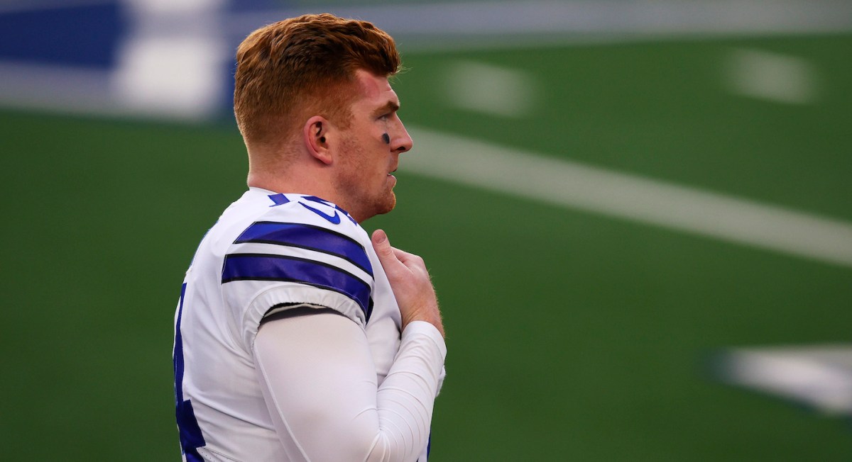 ARLINGTON, TEXAS - DECEMBER 20: Quarterback Andy Dalton #14 of the Dallas Cowboys looks on against the San Francisco 49ers during the first quarter at AT&amp;T Stadium on December 20, 2020 in Arlington, Texas. (Photo by Tom Pennington/Getty Images)