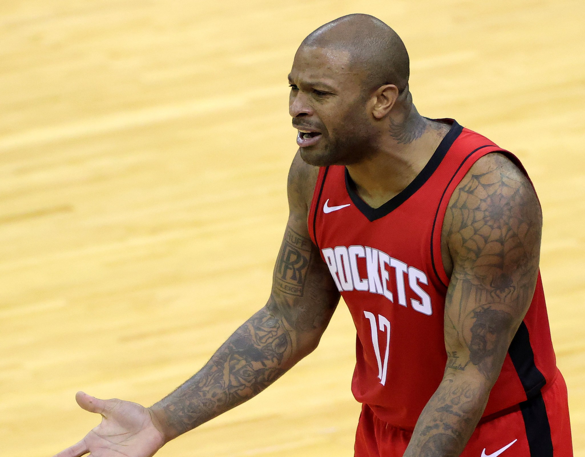 HOUSTON, TEXAS - JANUARY 10: P.J. Tucker #17 of the Houston Rockets in action against the Los Angeles Lakers during the second quarter of a game at Toyota Center on January 10, 2021 in Houston, Texas. NOTE TO USER: User expressly acknowledges and agrees that, by downloading and or using this photograph, User is consenting to the terms and conditions of the Getty Images License Agreement. (Photo by Carmen Mandato/Getty Images)