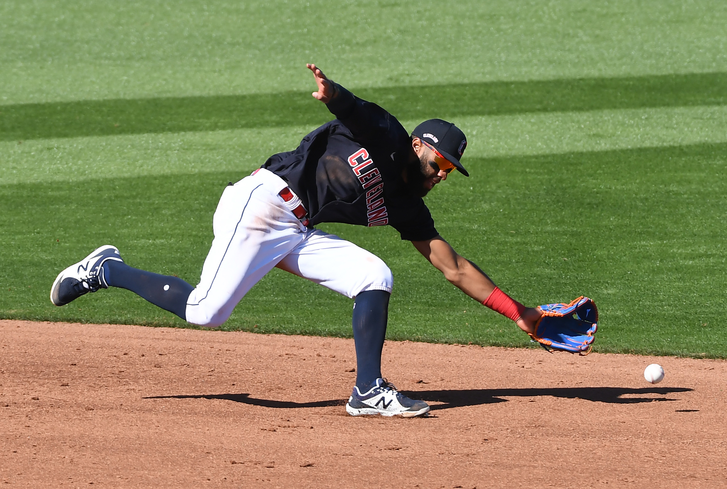 Amed Rosario of Cleveland can't get to a ground ball during a spring training game.