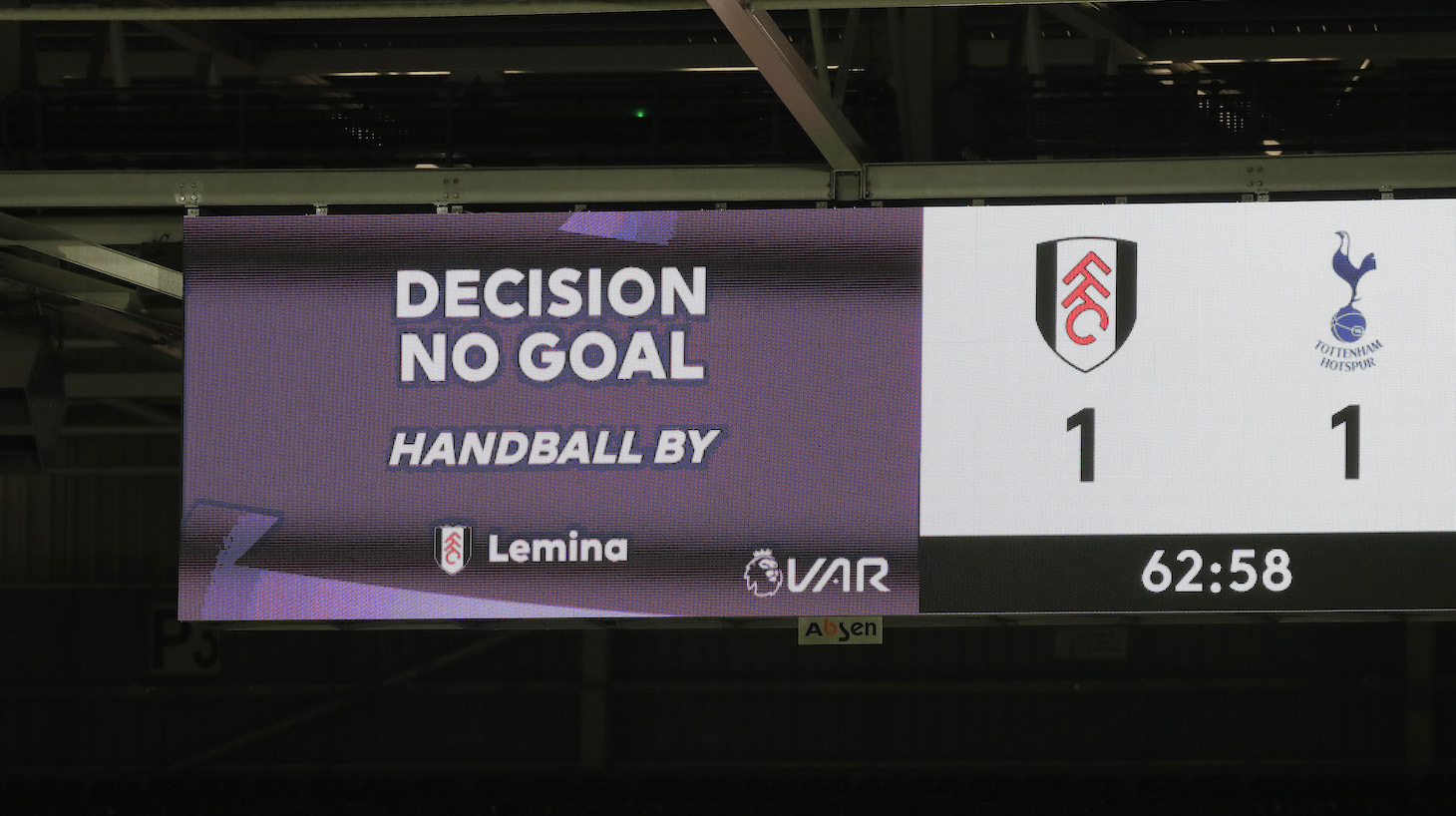 The big screen inside the stadium shows that a VAR review has decided to disallow a goal scored by Josh Maja of Fulham (not pictured) during the Premier League match between Fulham and Tottenham Hotspur at Craven Cottage on March 04, 2021 in London, England.