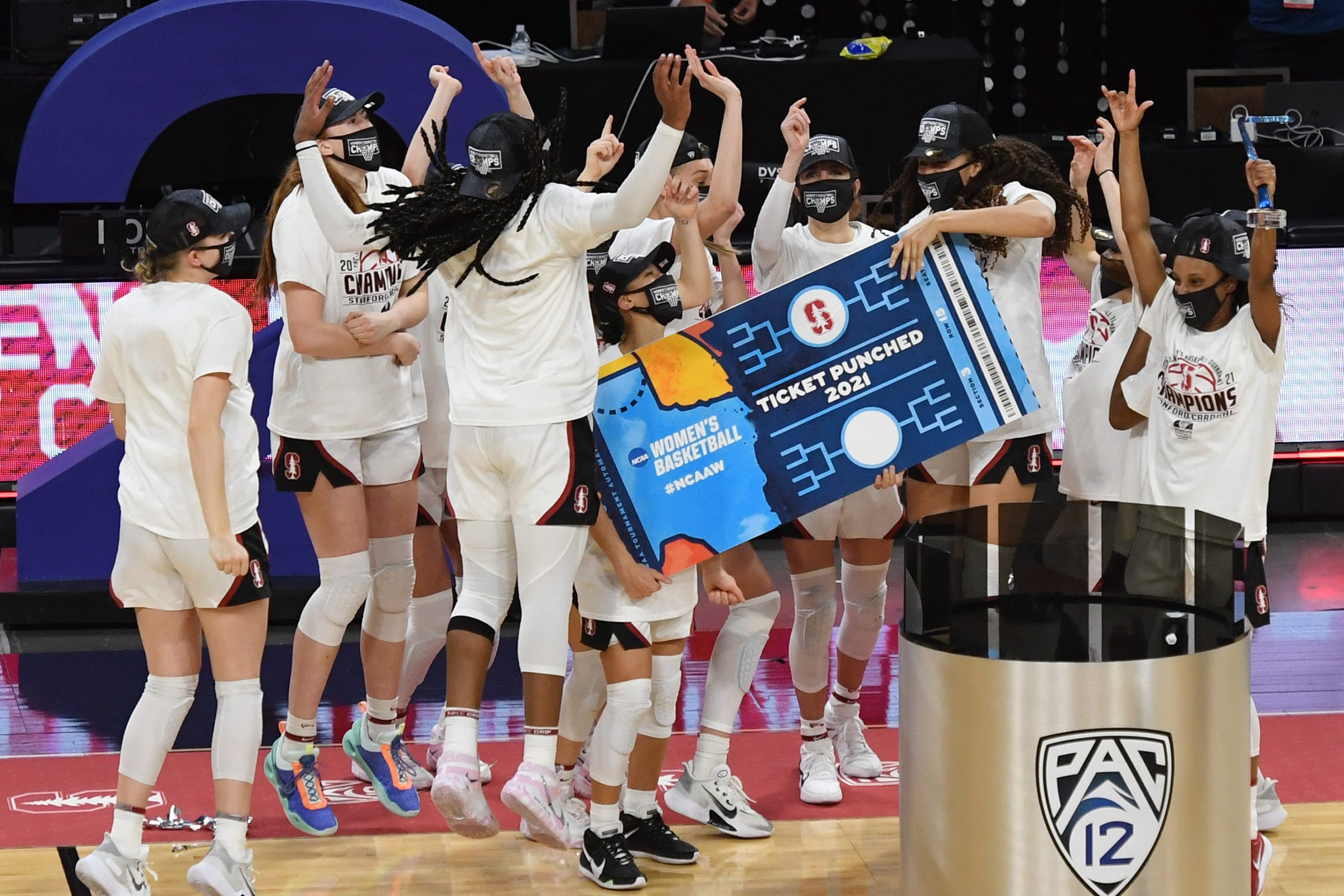 The Stanford Cardinal celebrate on the court after their 75-55 victory over the UCLA Bruins to win the championship game of the Pac-12 Conference women's basketball tournament at Michelob ULTRA Arena on March 7, 2021 in Las Vegas, Nevada.