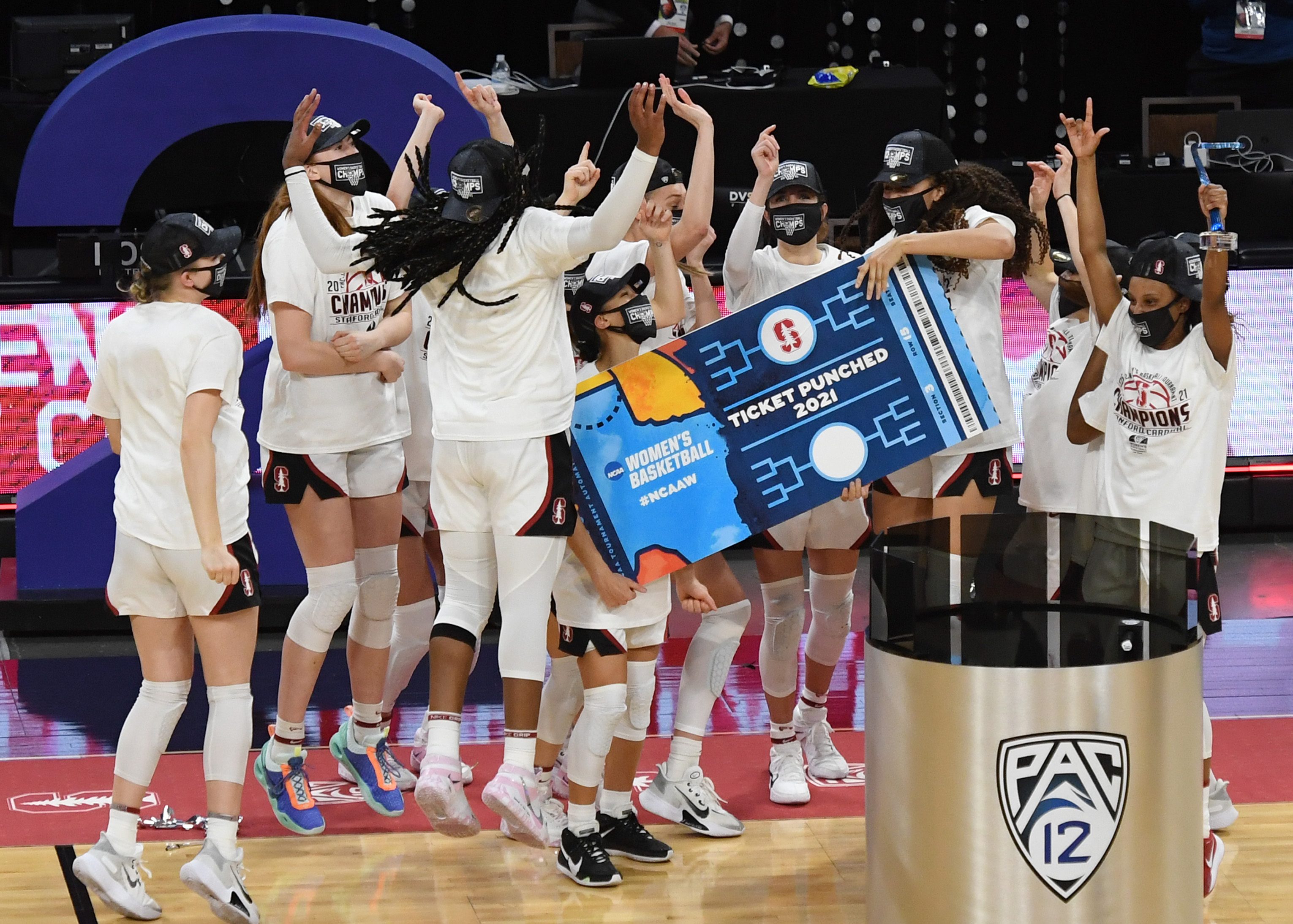 The Stanford Cardinal celebrate on the court after their 75-55 victory over the UCLA Bruins to win the championship game of the Pac-12 Conference women's basketball tournament at Michelob ULTRA Arena on March 7, 2021 in Las Vegas, Nevada.