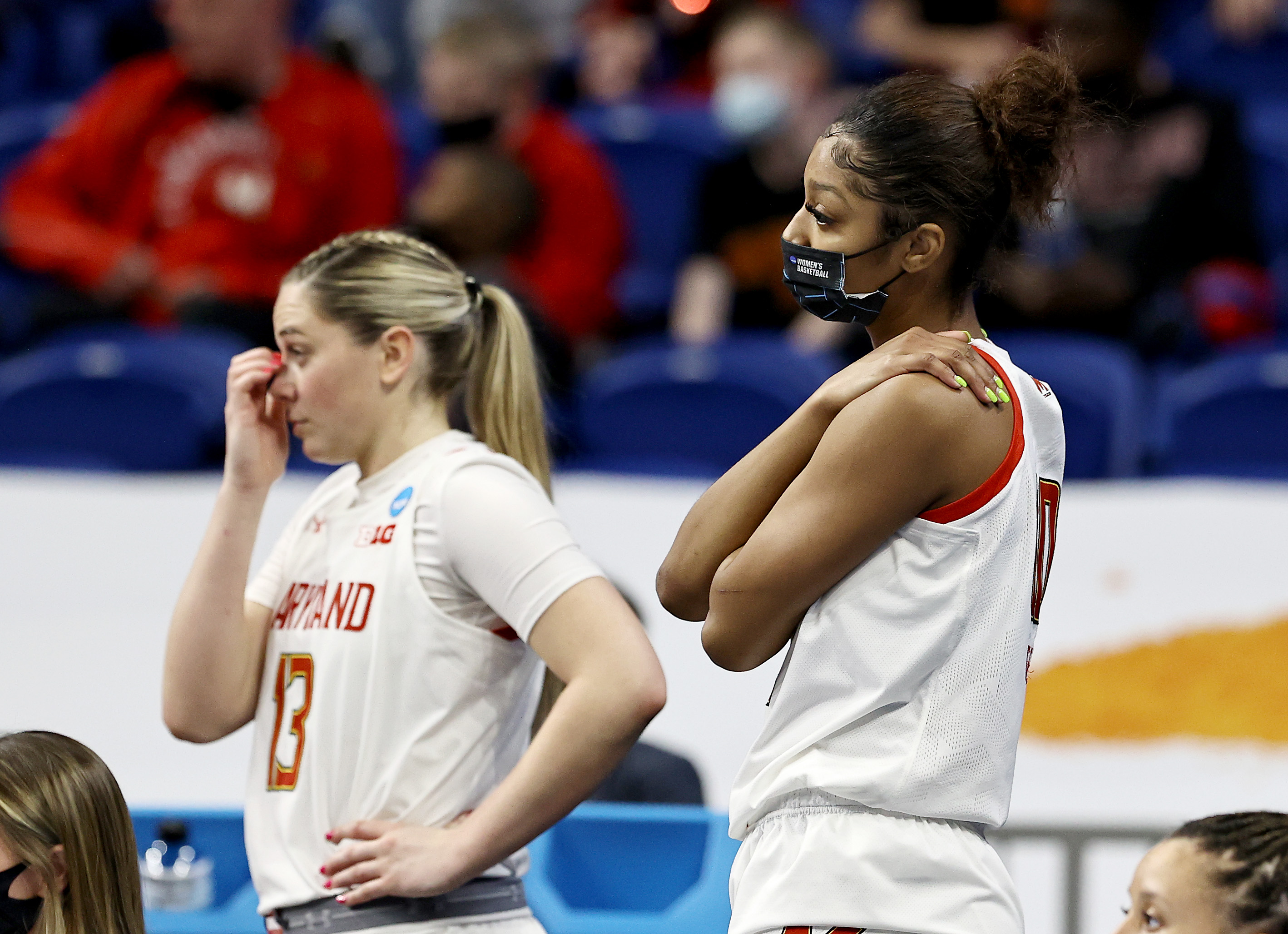 Faith Masonius #13 and Angel Reese #10 of the Maryland Terrapins react to the loss to the Texas Longhorns during the Sweet Sixteen round of the NCAA Women's Basketball Tournament at the Alamodome on March 28, 2021 in San Antonio, Texas.The Texas Longhorns defeated the Maryland Terrapins 64-61