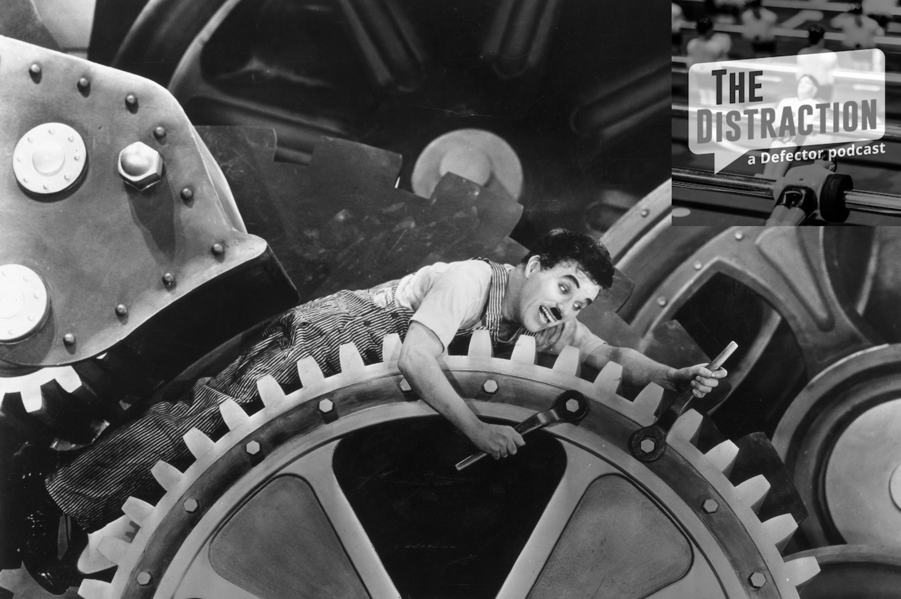A still image of a very stressed out Charlie Chaplin from his film "Modern Times."