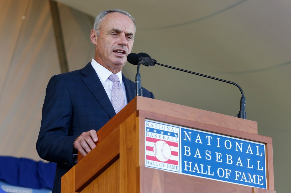 MLB Commissioner Rob Manfred, seen here in Cooperstown, being weird.