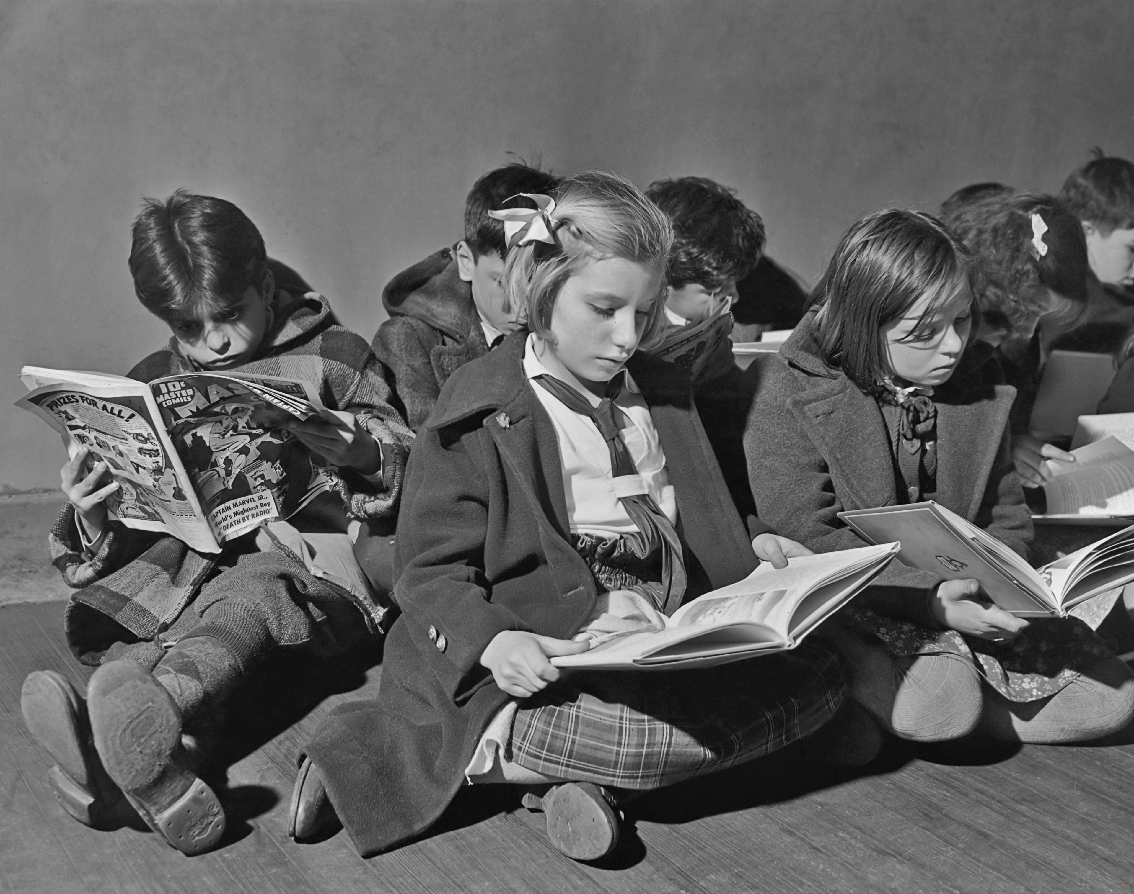Children read books and comics in 1942.