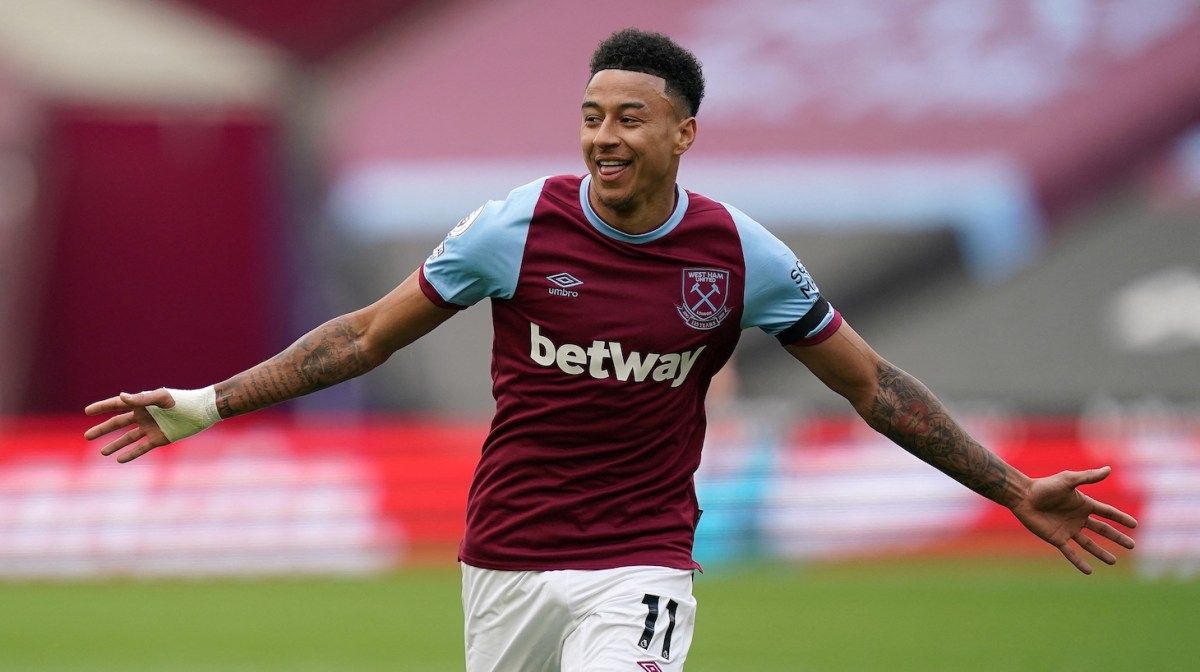 West Ham United's English midfielder Jesse Lingard celebrates scoring the opening goal during the English Premier League football match between West Ham United and Leicester City at The London Stadium, in east London on April 11, 2021.