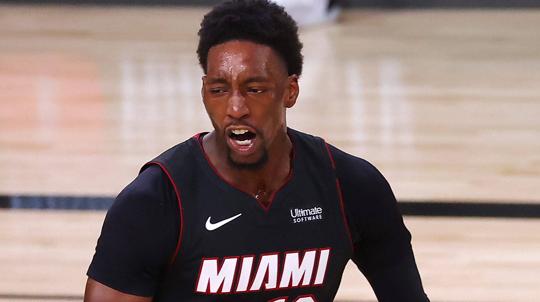 Bam Adebayo #13 of the Miami Heat reacts during the fourth quarter against the Boston Celtics in Game Six of the Eastern Conference Finals during the 2020 NBA Playoffs at AdventHealth Arena at the ESPN Wide World Of Sports Complex on September 27, 2020 in Lake Buena Vista, Florida