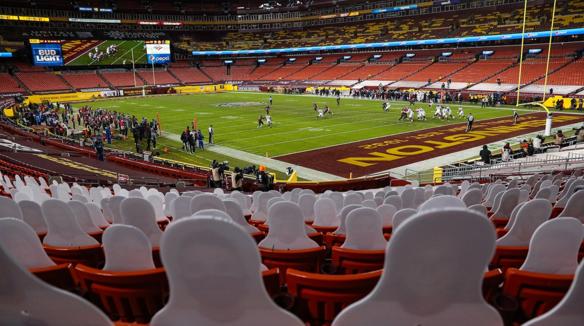 LANDOVER, MARYLAND - JANUARY 09: Cardboard cutouts are seen in a general view as the Tampa Bay Buccaneers play the Washington Football Team during the second quarter of the NFC Wild Card Playoff Round at FedExField on January 09, 2021 in Landover, Maryland. No fans were permitted due to health concerns over the Covid-19 pandemic. (Photo by Patrick Smith/Getty Images)