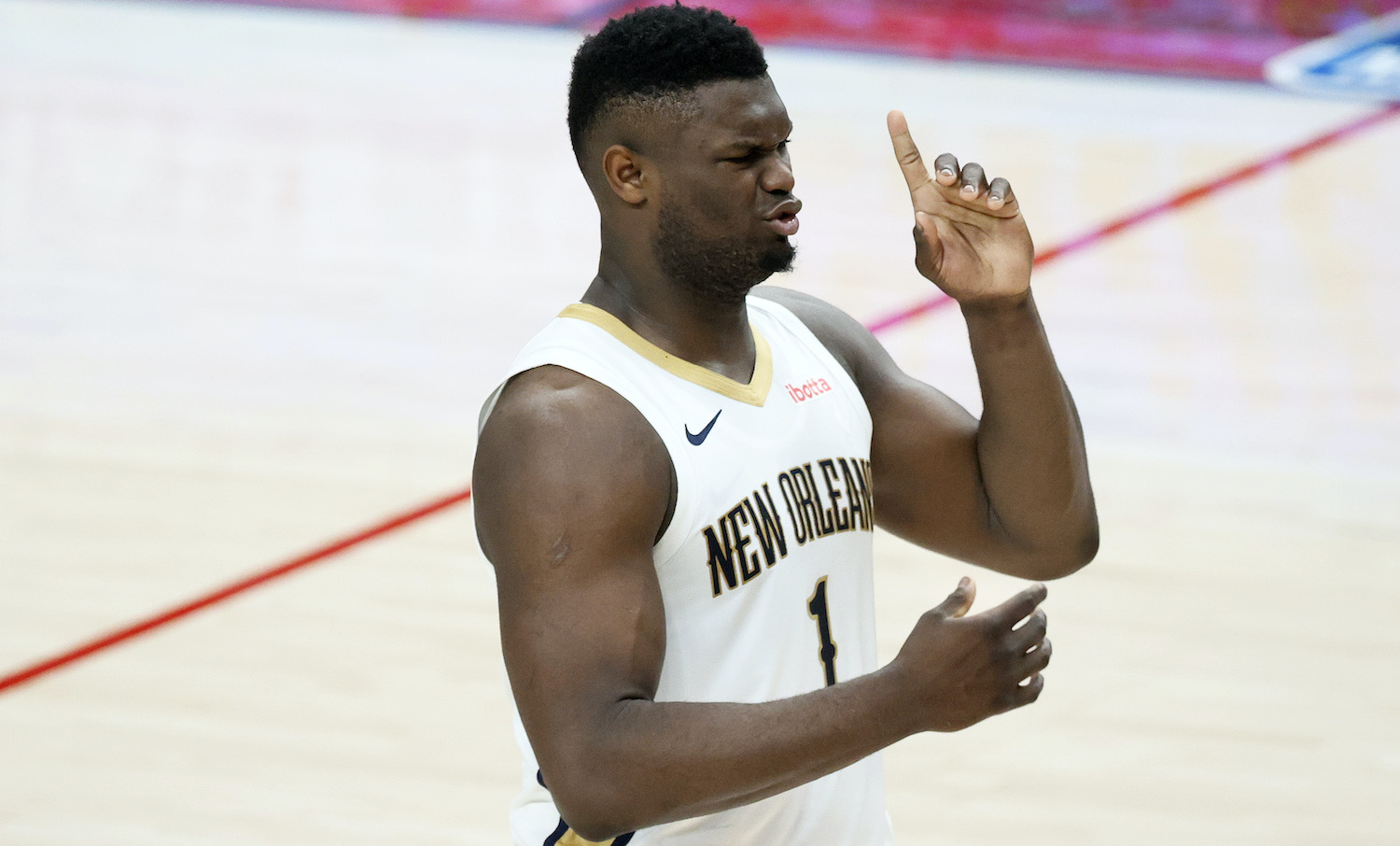 PORTLAND, OREGON - MARCH 18: Zion Williamson #1 of the New Orleans Pelicans reacts during the first quarter against the Portland Trail Blazers at Moda Center on March 18, 2021 in Portland, Oregon. NOTE TO USER: User expressly acknowledges and agrees that, by downloading and or using this photograph, User is consenting to the terms and conditions of the Getty Images License Agreement. (Photo by Steph Chambers/Getty Images)