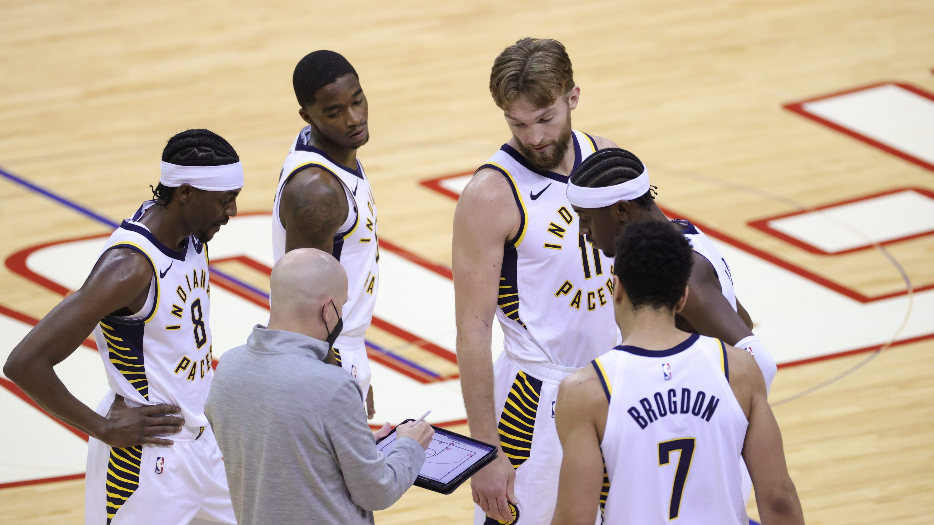 Head coach Nate Bjorkgren diagrams a play for the Indiana Pacers during a timeout