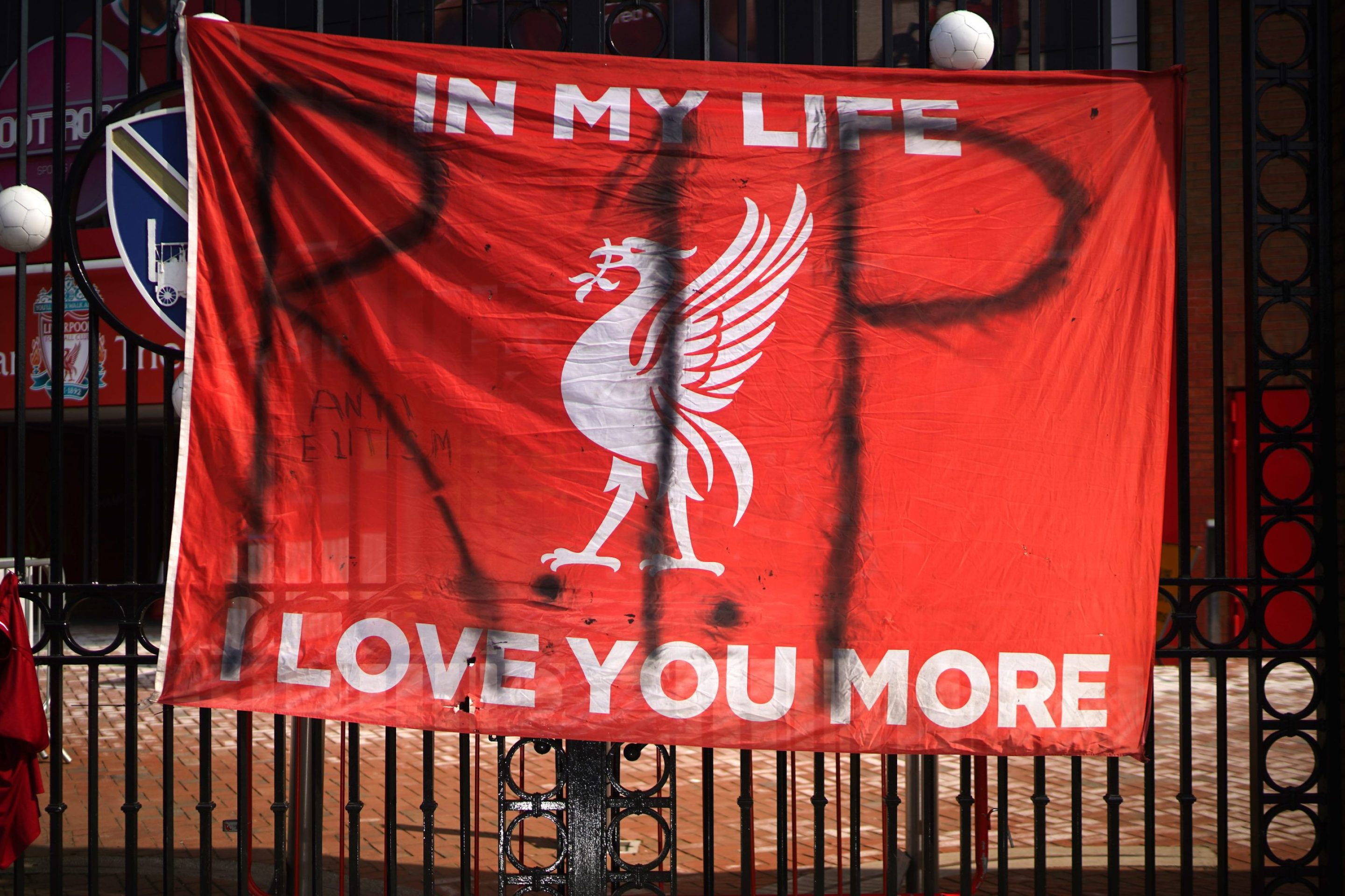 Banners and football scarves are tied to the fences around Anfield Stadium, the home of Liverpool Football Club, in protest at the club's intentions to join the European Super League on April 20, 2021 in Liverpool, United Kingdom.