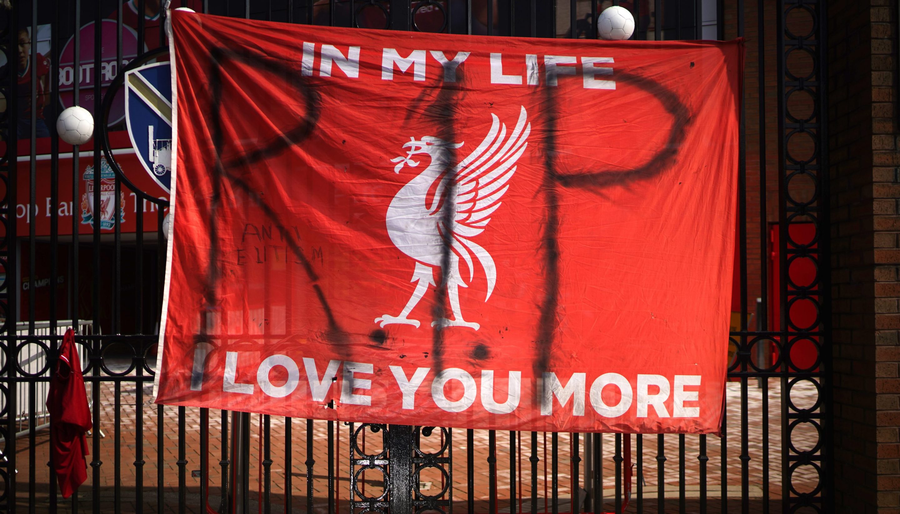 Banners and football scarves are tied to the fences around Anfield Stadium, the home of Liverpool Football Club, in protest at the club's intentions to join the European Super League on April 20, 2021 in Liverpool, United Kingdom.