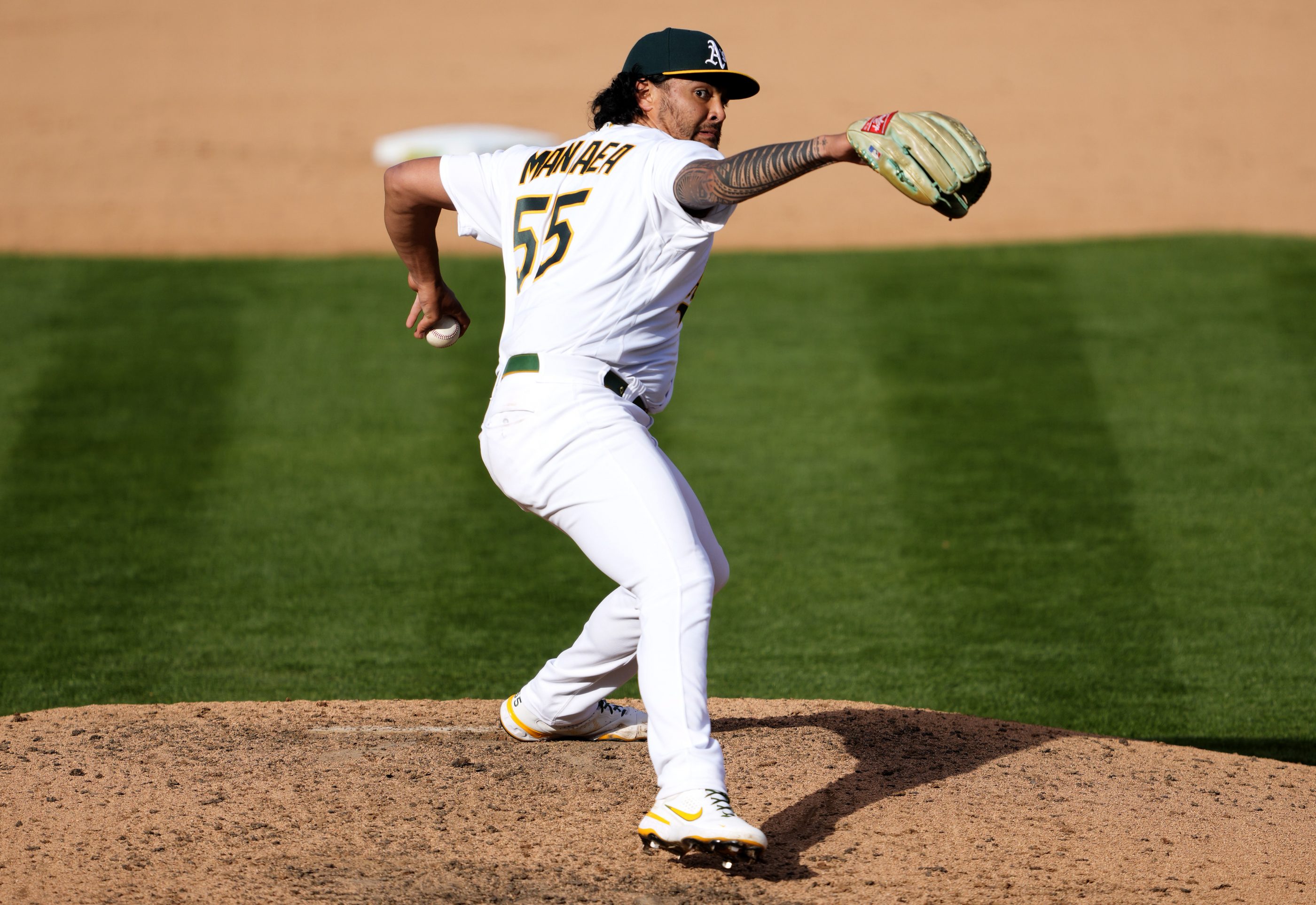 Sean Manaea pitches