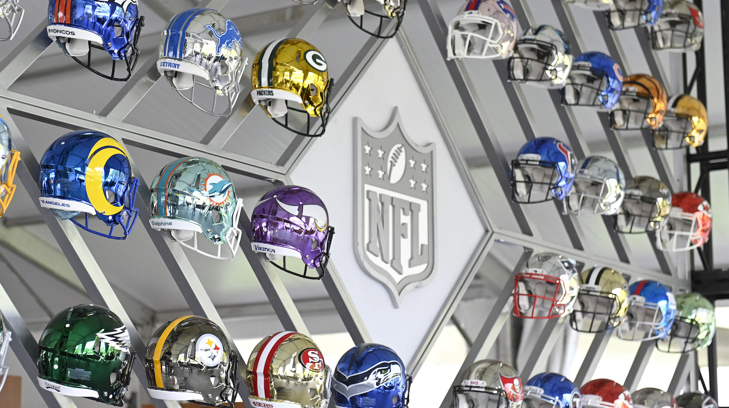 CLEVELAND, OHIO - APRIL 28: Wall of NFL team helmets on display inside the NFL Locker Room at the NFL Draft Experience on April 28, 2021 in Cleveland, Ohio. (Photo by Duane Prokop/Getty Images)