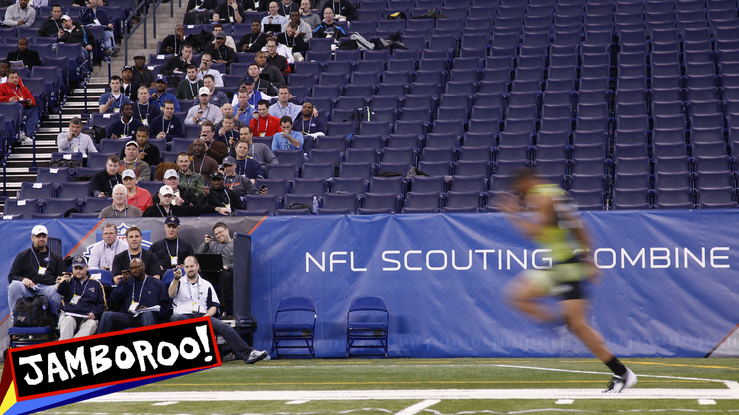 INDIANAPOLIS, IN - FEBRUARY 28: Scouts look on as a player runs the 40-yard dash during the 2012 NFL Combine at Lucas Oil Stadium on February 28, 2012 in Indianapolis, Indiana. (Photo by Joe Robbins/Getty Images)