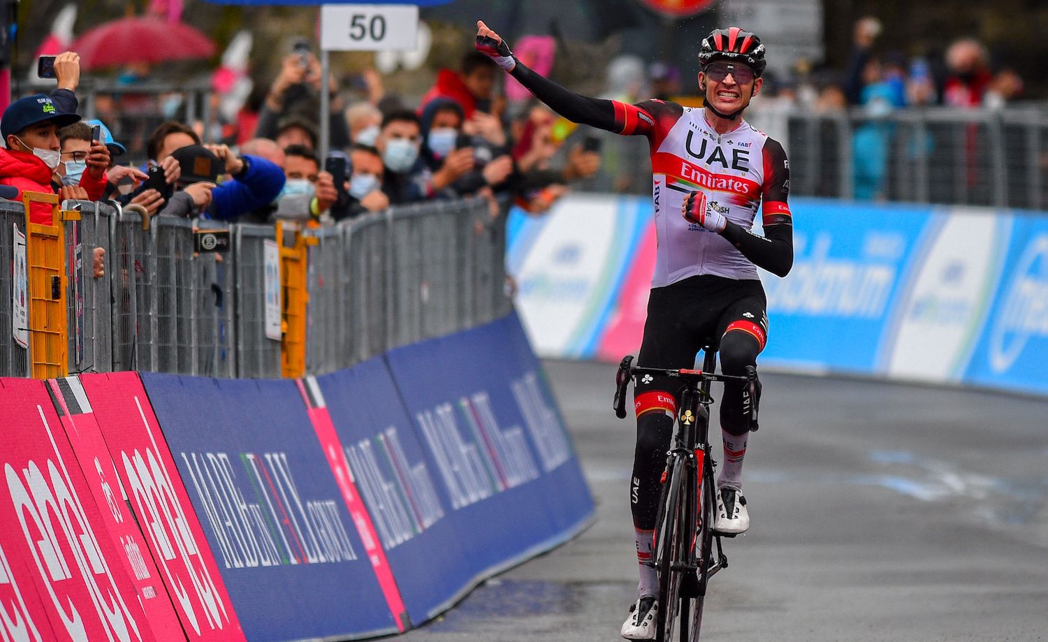Team UAE Emirates rider US Joe Dombrowski celebrates as he crosses the finish line to win the fourth stage of the Giro d'Italia 2021 cycling race, 187 km between Piacenza and Sestola, Emilia-Romagna, on May 11, 2021. (Photo by Dario BELINGHERI / AFP) (Photo by DARIO BELINGHERI/AFP via Getty Images)