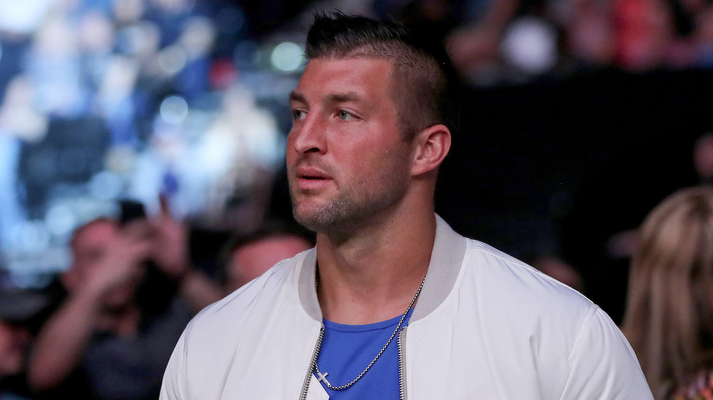 JACKSONVILLE, FL - APRIL 24: Tim Tebow is seen by the octagon during UFC 261 at VyStar Veterans Memorial Arena on April 24, 2021 in Jacksonville, Florida. (Photo by Alex Menendez/Getty Images)