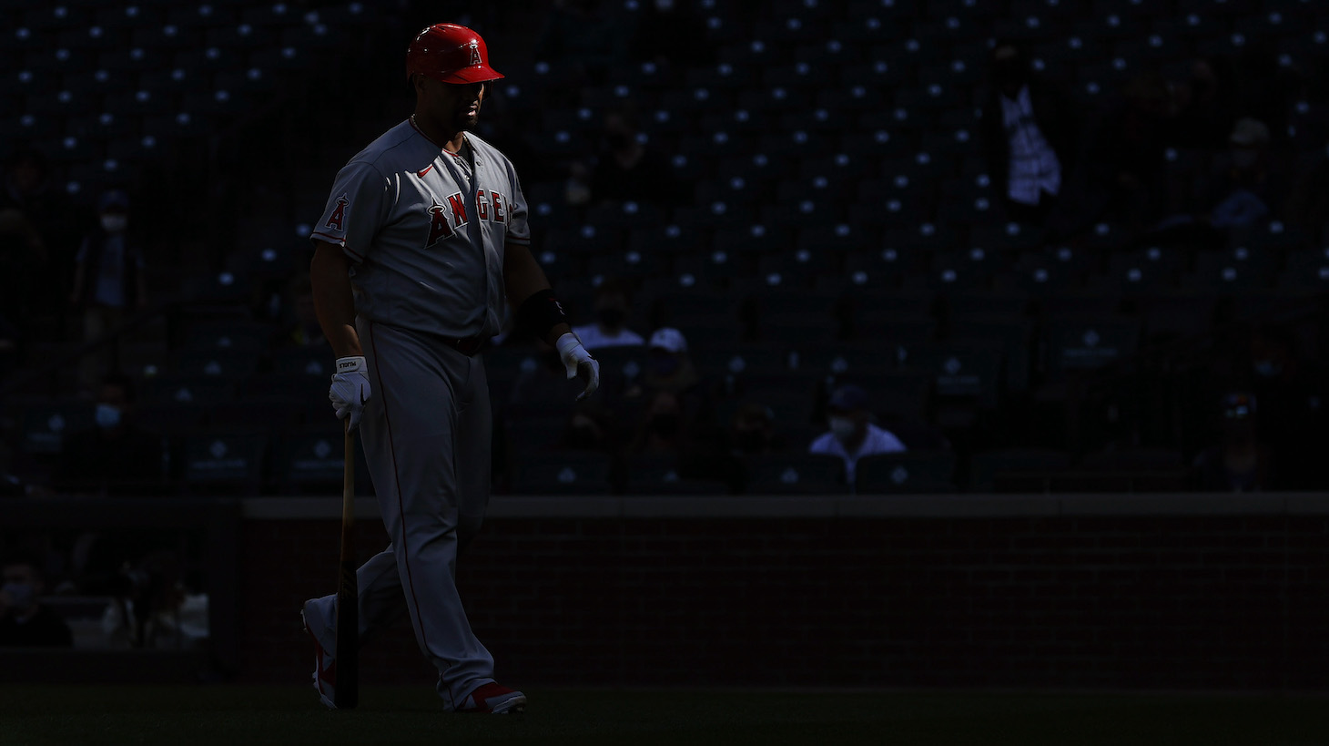 SEATTLE, WASHINGTON - MAY 02: Albert Pujols #5 of the Los Angeles Angels walks to the dugout after striking out against the Seattle Mariners ninth inning at T-Mobile Park on May 02, 2021 in Seattle, Washington. (Photo by Steph Chambers/Getty Images)
