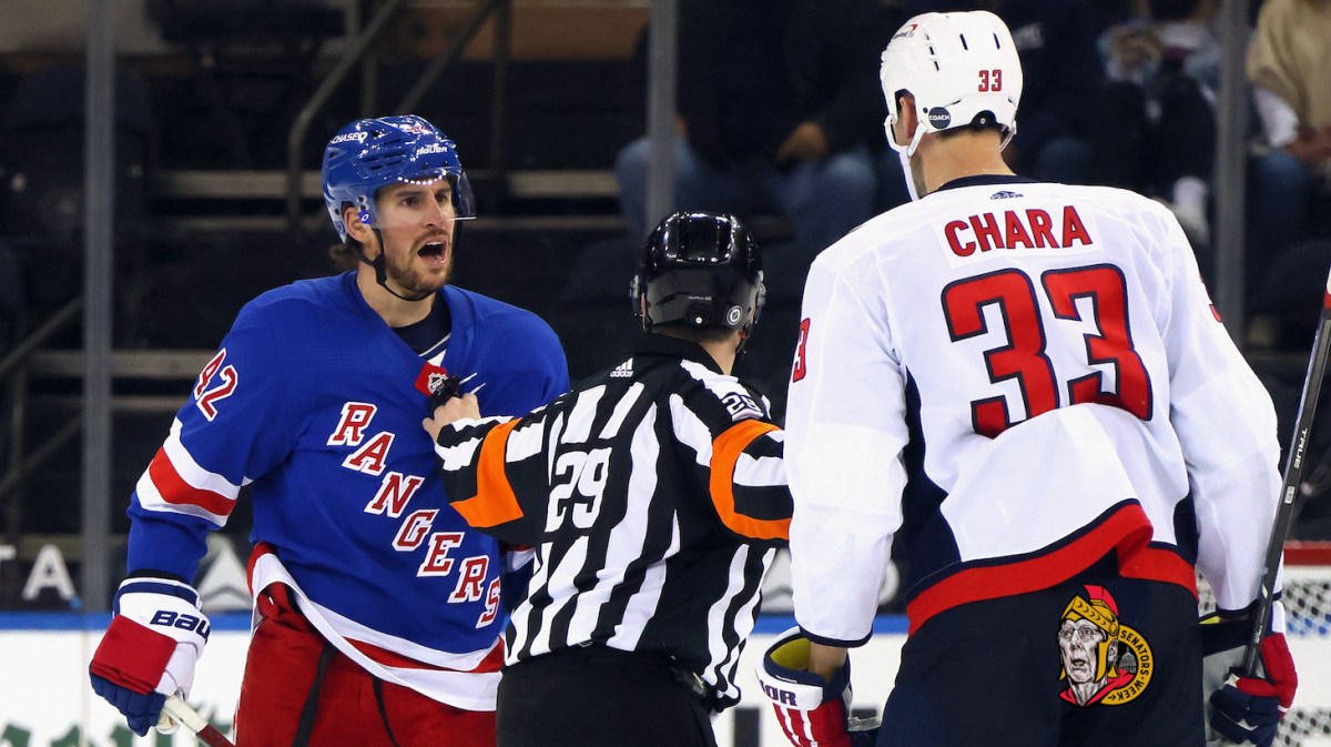 NEW YORK, NEW YORK - MAY 05: Brendan Smith #42 of the New York Rangers chats with Zdeno Chara #33 of the Washington Capitals during the second period at Madison Square Garden on May 05, 2021 in New York City. (Photo by Bruce Bennett/Getty Images)