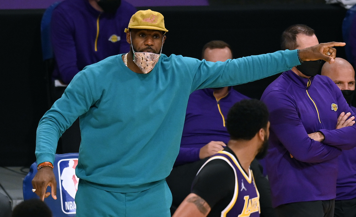 LOS ANGELES, CALIFORNIA - MAY 11: LeBron James #23 of the Los Angeles Lakers reacts to play behind Anthony Davis #3 during the third quarter against the New York Knicks at Staples Center on May 11, 2021 in Los Angeles, California. (Photo by Harry How/Getty Images)