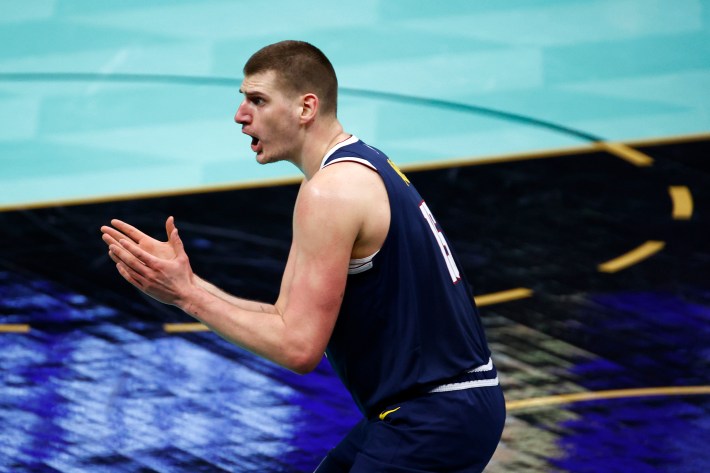 Nikola Jokic gesticulates at an unseen referee