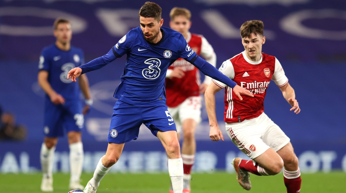 Jorginho of Chelsea battles for possession with Kieran Tierney of Arsenal during the Premier League match between Chelsea and Arsenal at Stamford Bridge on May 12, 2021 in London, England.