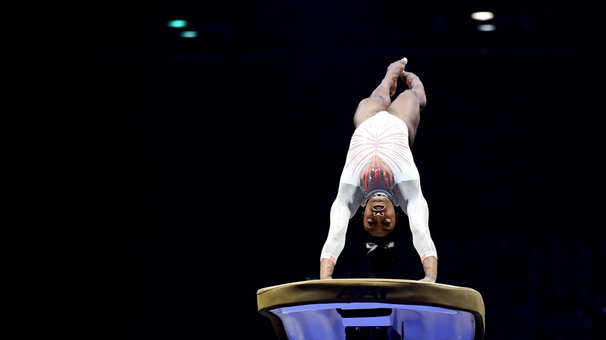 Simone Biles does the Yurchenko double pike while competing on the vault during the 2021 GK U.S. Classic gymnastics competition at the Indiana Convention Center on May 22, 2021 in Indianapolis, Indiana. Biles became the first woman in history to land the Yurchenko double pike in competition.