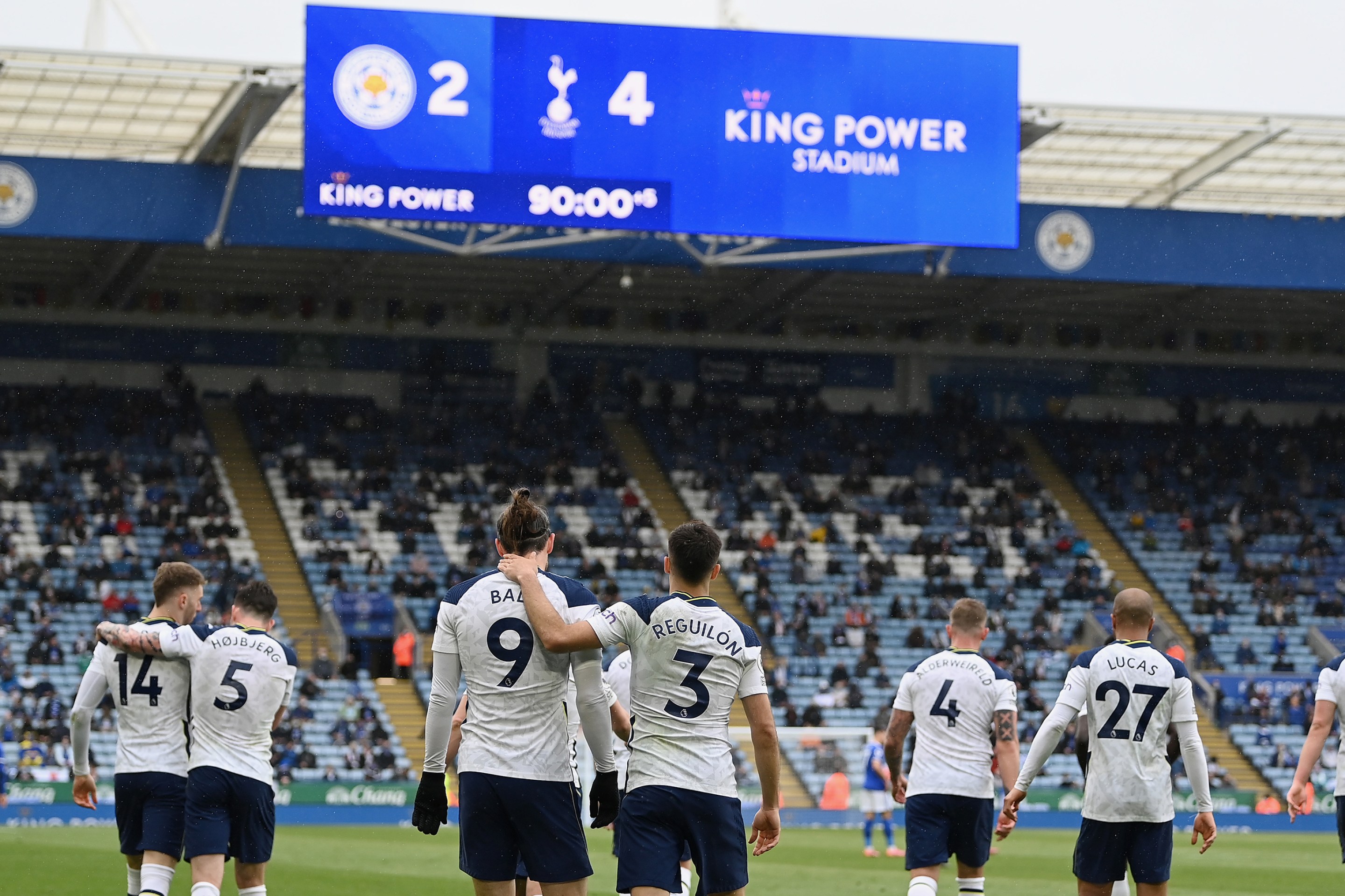Gareth Bale of Tottenham Hotspur celebrates with teammate Sergio Reguilon after scoring his team's fourth goal during the Premier League match between Leicester City and Tottenham Hotspur at The King Power Stadium on May 23, 2021 in Leicester, England.