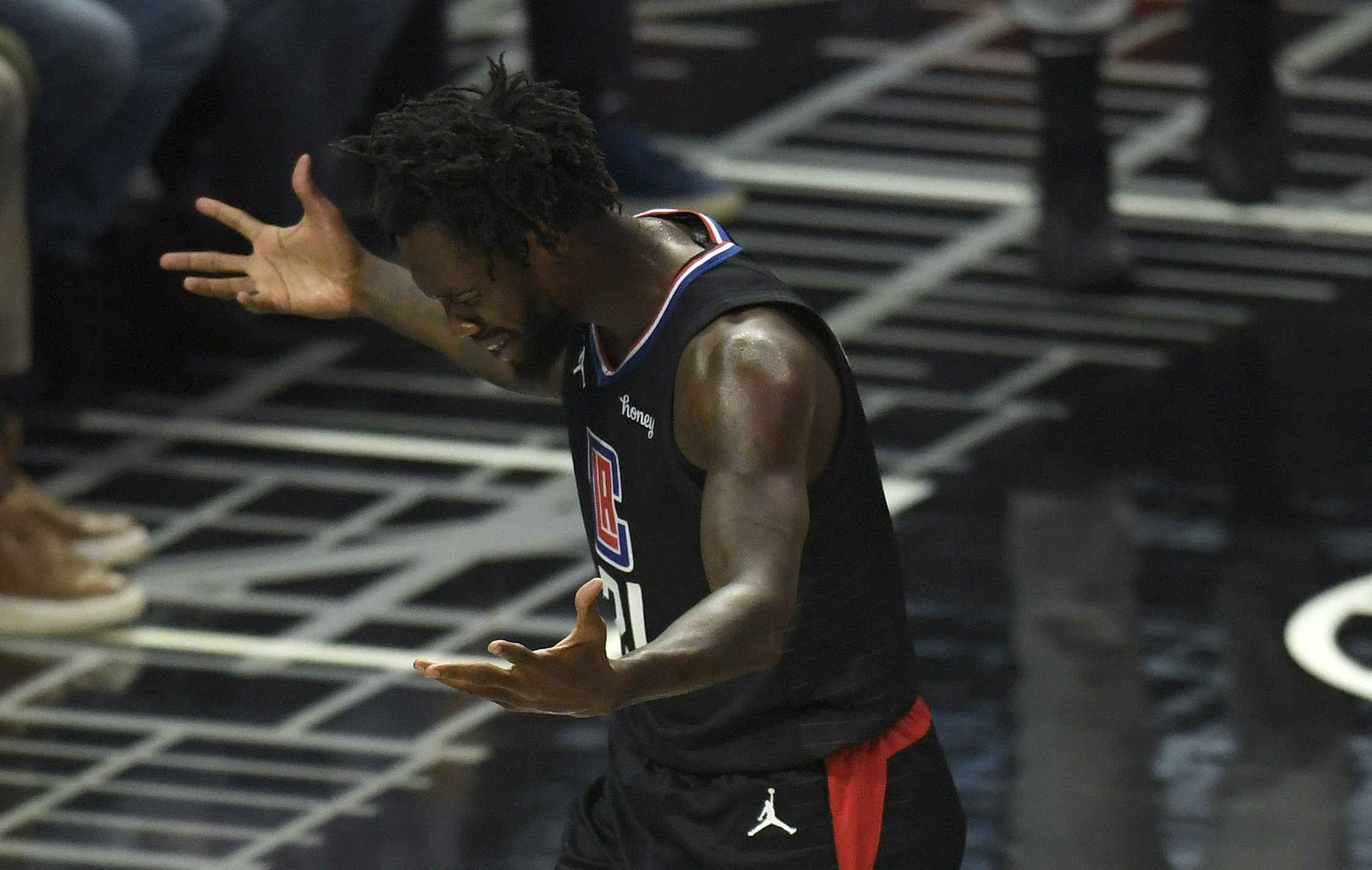 Patrick Beverley looks bummed after committing a foul.
