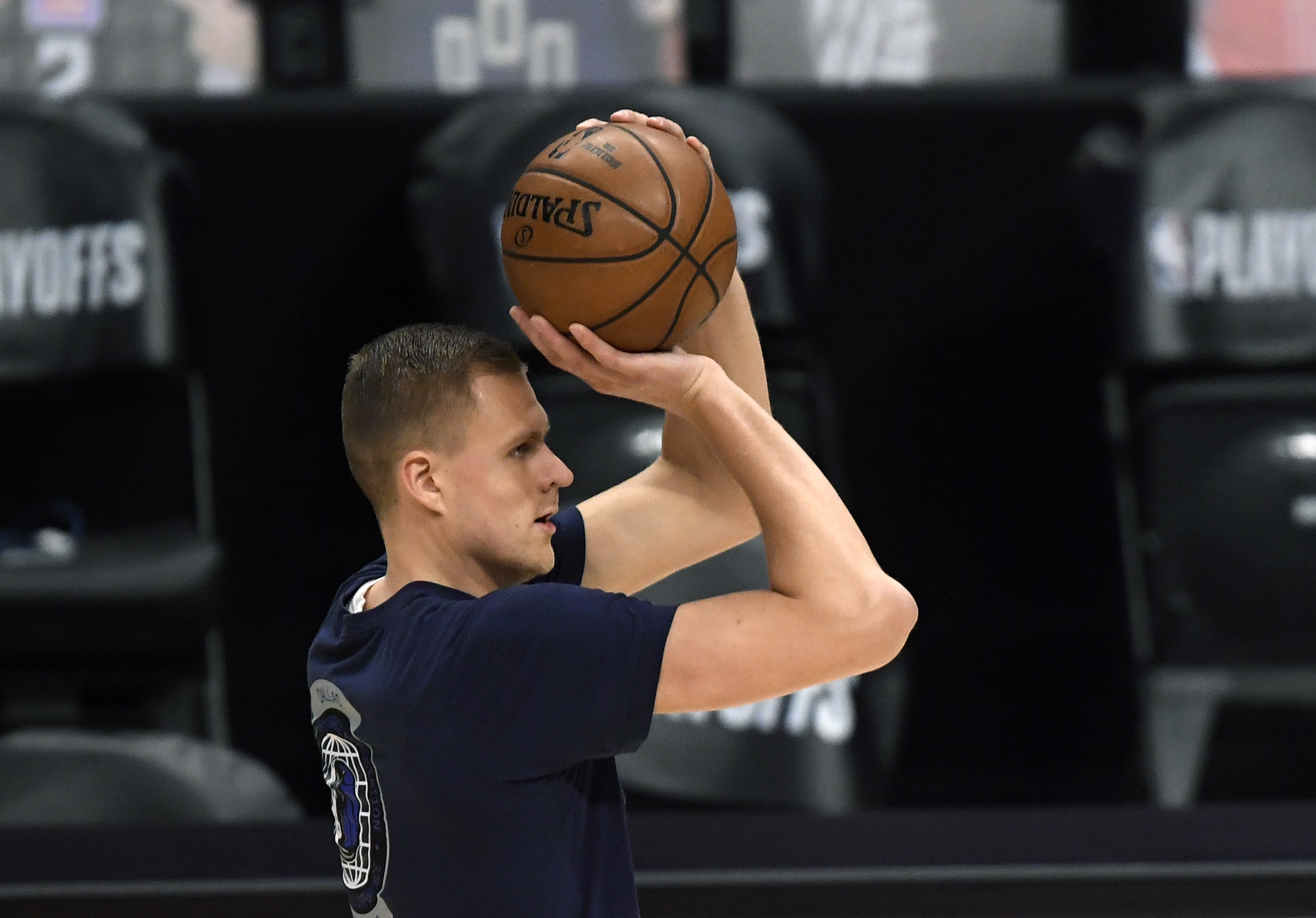 Kristaps Porzingis shoots warmup jumpers prior to the start of Game 7 against the Clippers.