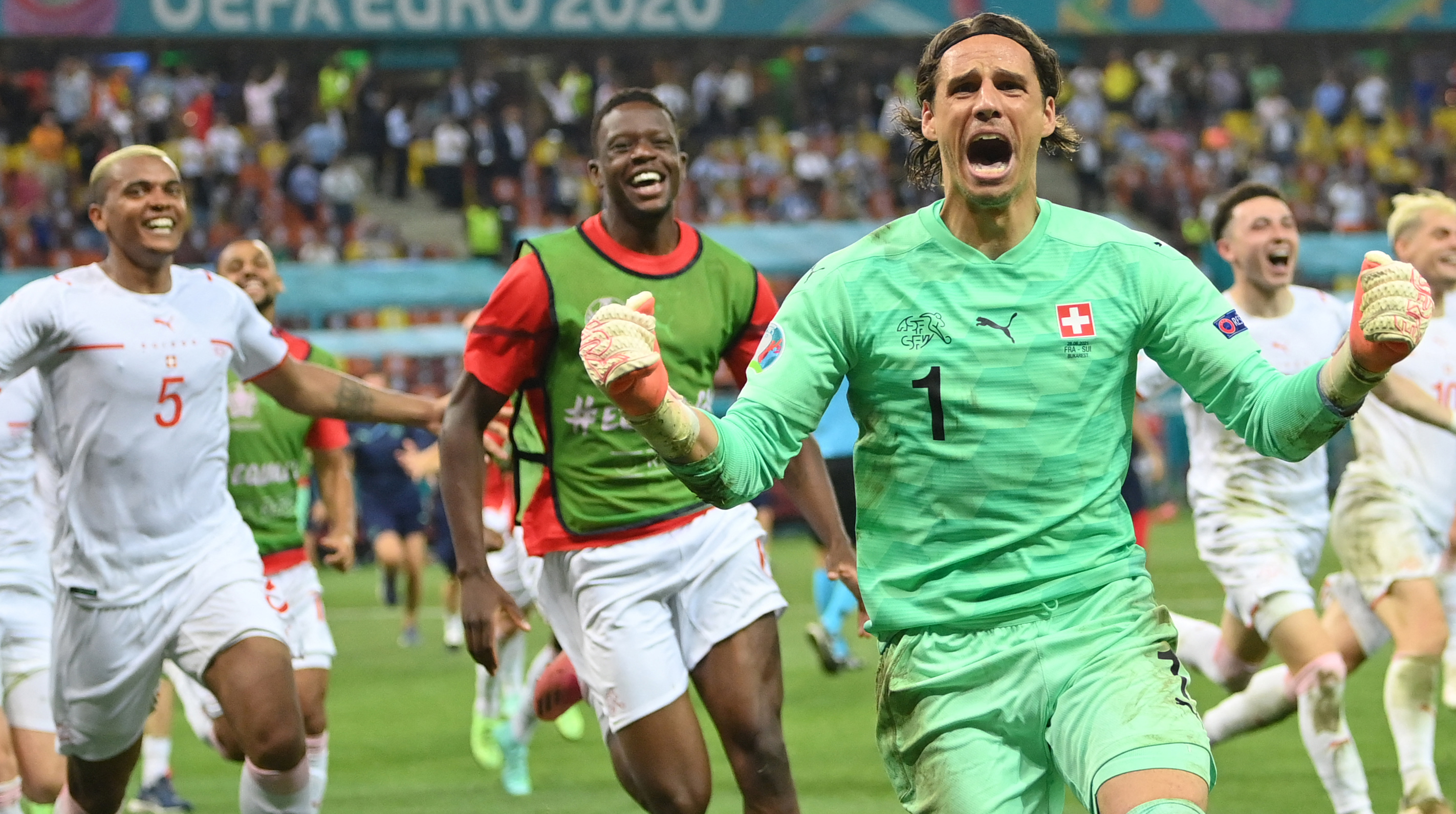 Switzerland's goalkeeper Yann Sommer reacts after saving a shot by France's forward Kylian Mbappe in the penalty shootout during the UEFA EURO 2020 round of 16 football match between France and Switzerland at the National Arena in Bucharest on June 28, 2021