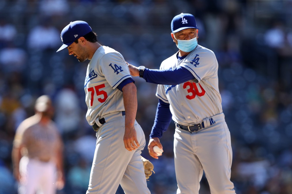 Dave Roberts removes Scott Alexander from a Dodgers game in May.