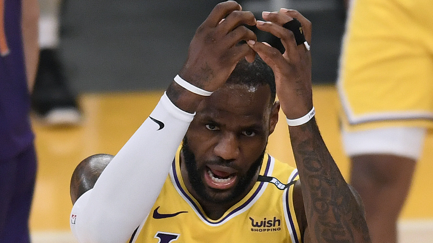 LOS ANGELES, CALIFORNIA - JUNE 03: LeBron James #23 of the Los Angeles Lakers reacts after a Phoenix Suns foul in the second quarter during game six of the Western Conference first round series at Staples Center on June 03, 2021 in Los Angeles, California. (Photo by Harry How/Getty Images) NOTE TO USER: User expressly acknowledges and agrees that, by downloading and or using this photograph, User is consenting to the terms and conditions of the Getty Images License Agreement.