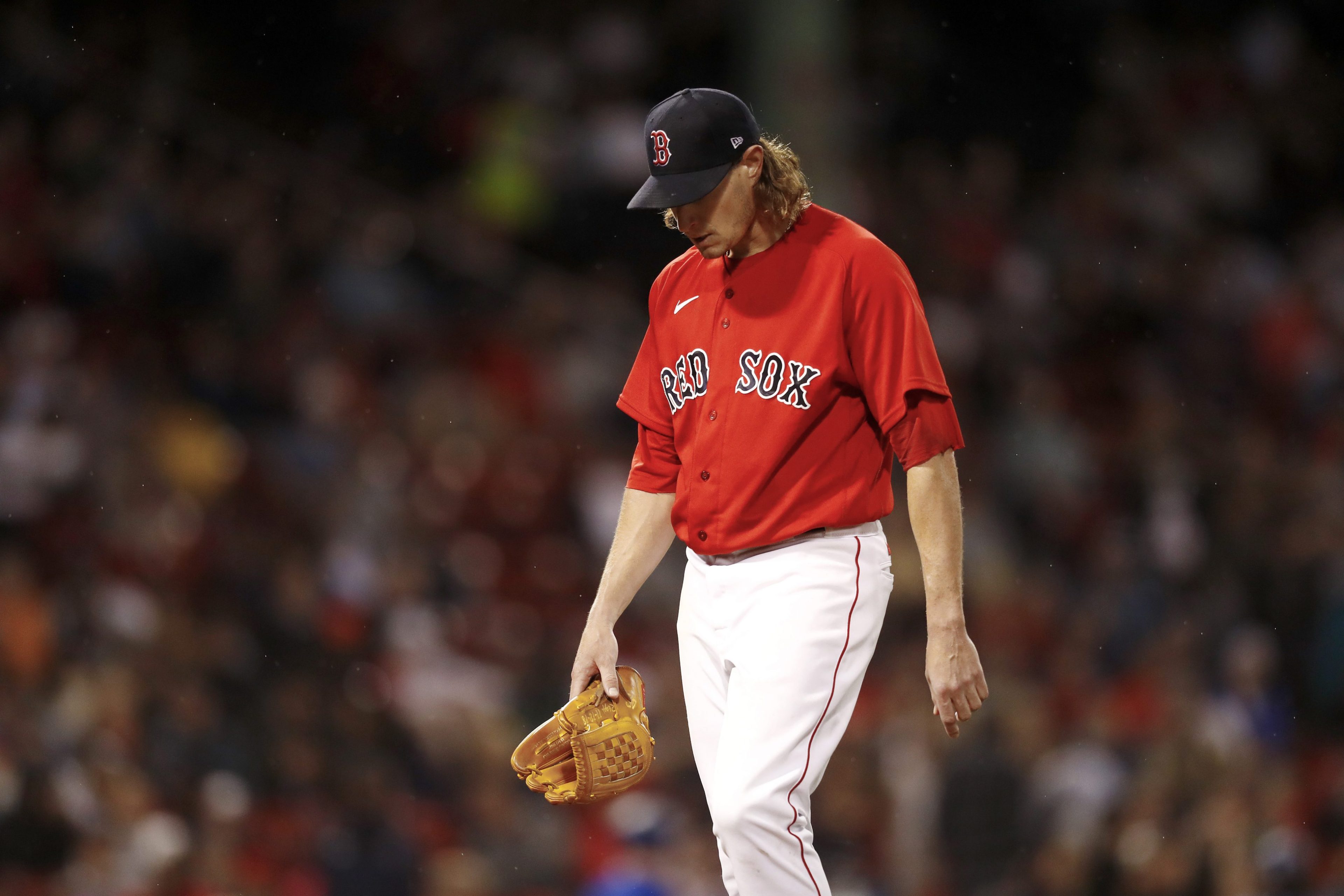 Boston Red Sox pitcher Garrett Richards leaving the mound after one of his three bad starts since the sticky stuff ban.