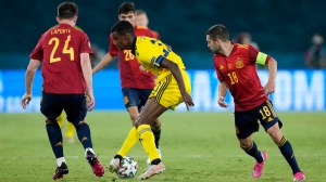 Alexander Isak of Sweden turns with the ball whilst under pressure from Aymeric Laporte and Jordi Alba of Spain during the UEFA Euro 2020 Championship Group E match between Spain and Sweden at the La Cartuja Stadium on June 14, 2021 in Seville, Spain.