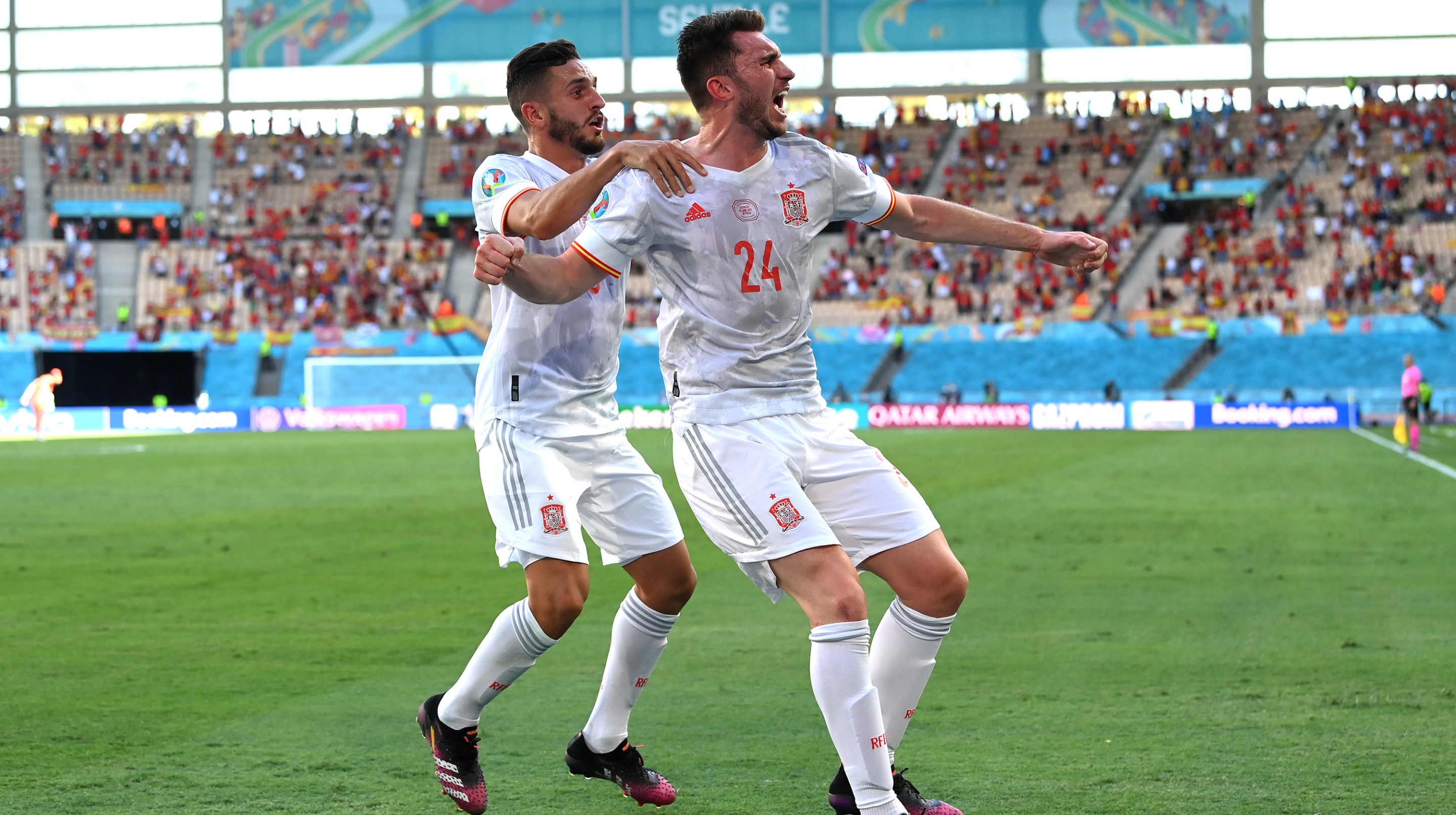 Aymeric Laporte of Spain celebrates with Koke after scoring their side's second goal during the UEFA Euro 2020 Championship Group E match between Slovakia and Spain at Estadio La Cartuja on June 23, 2021 in Seville, Spain.