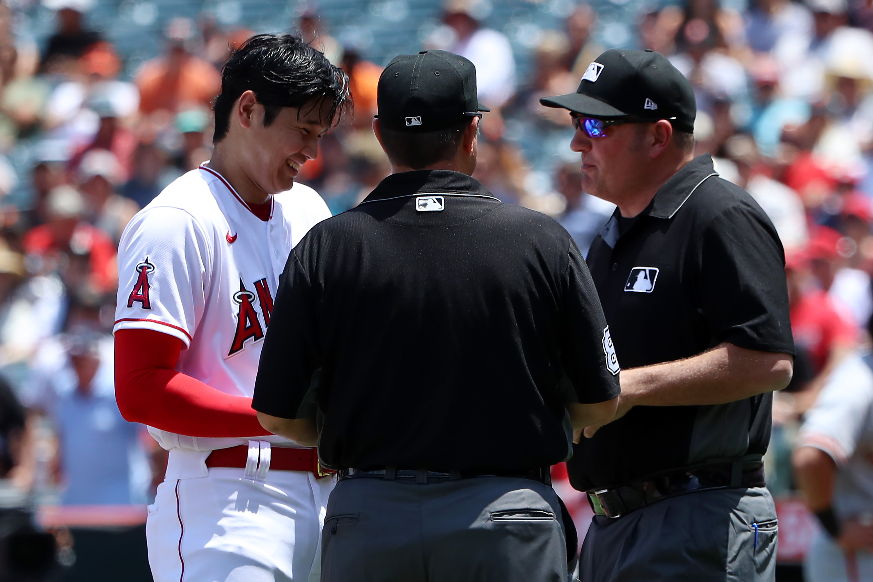 Shohei Ohtani chuckles good-naturedly through a search for sticky stuff.