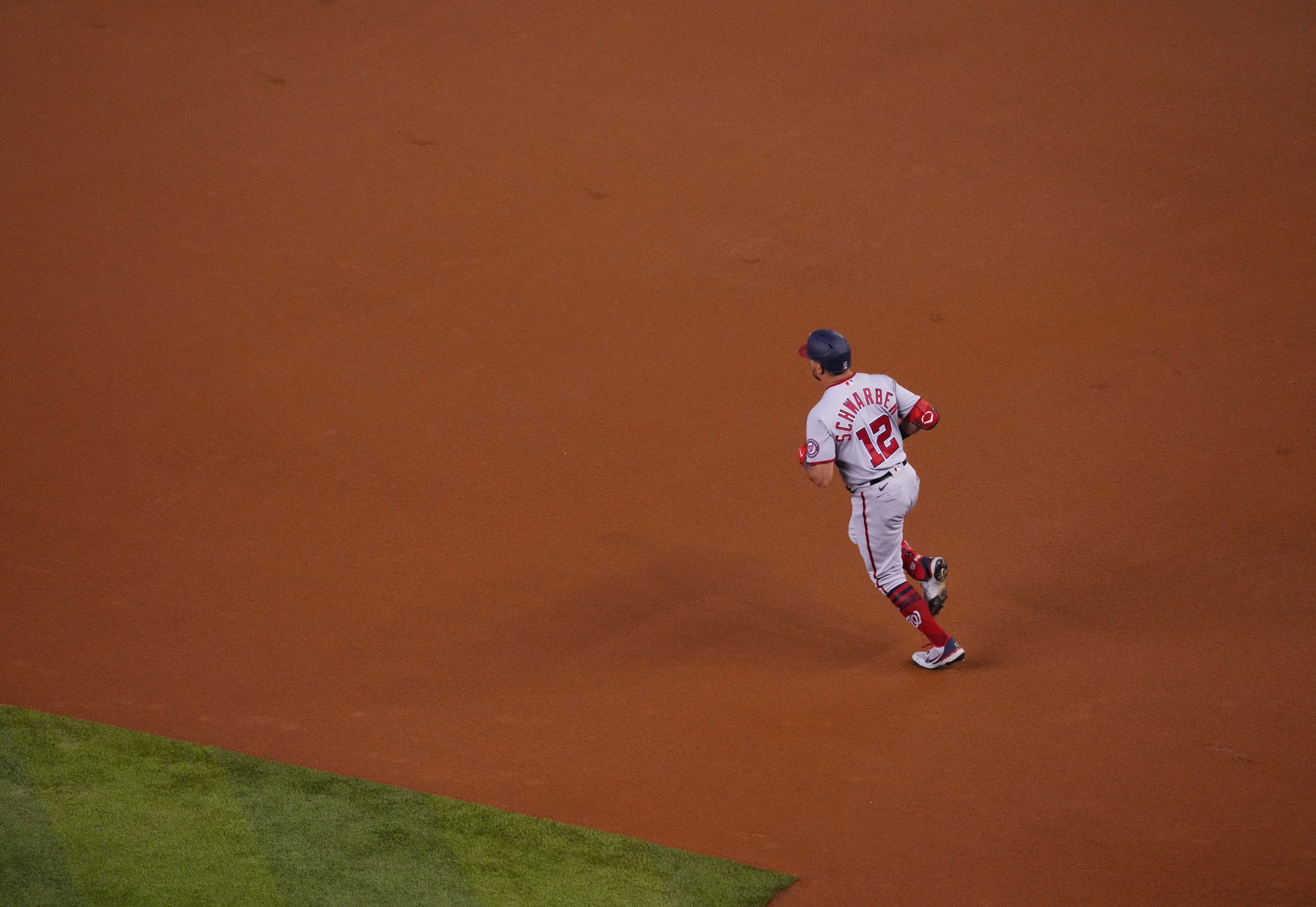 Lord Of The Long Ball Kyle Schwarber rounds the bases after another big fly.