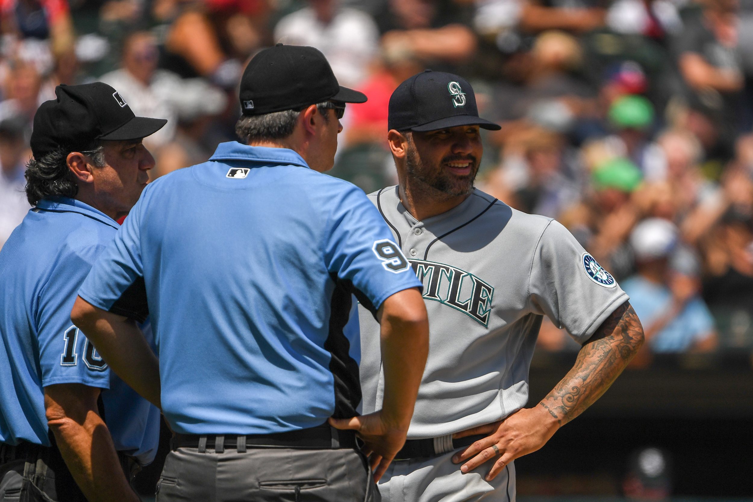 Hector Santiago of the Mariners gets ejected by umpires for having slime inside his glove.