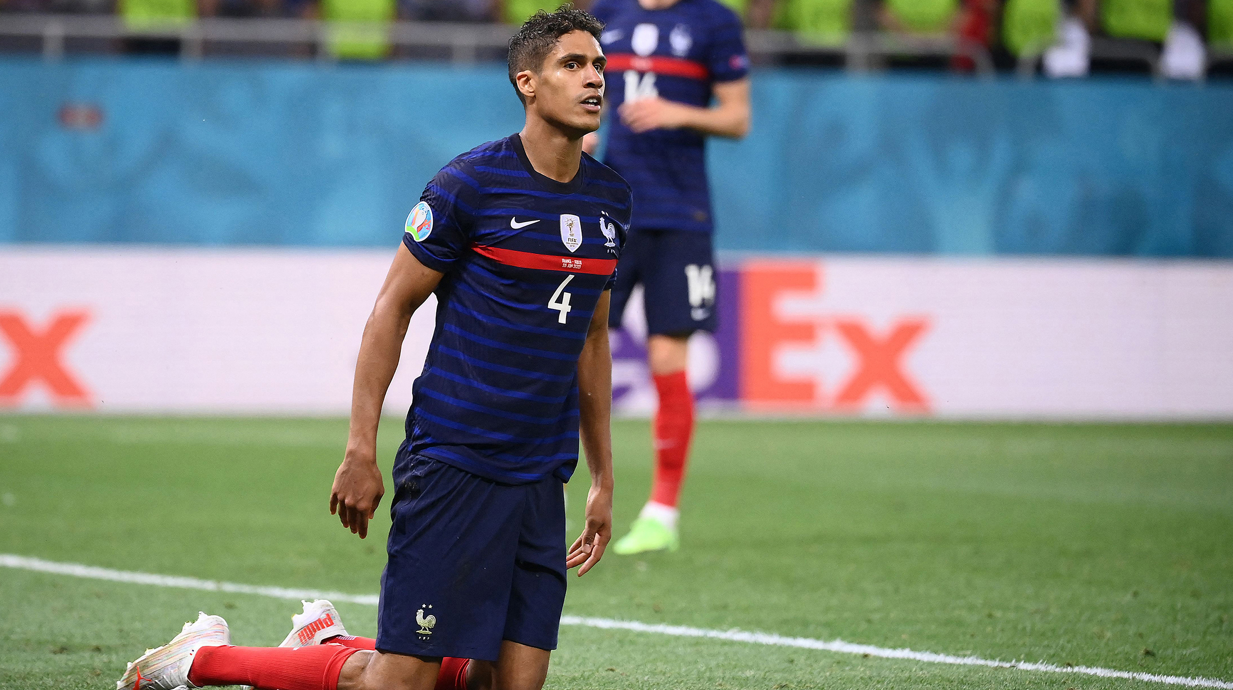 France's defender Raphael Varane gets back on his feet during the UEFA EURO 2020 round of 16 football match between France and Switzerland at the National Arena in Bucharest on June 28, 2021.