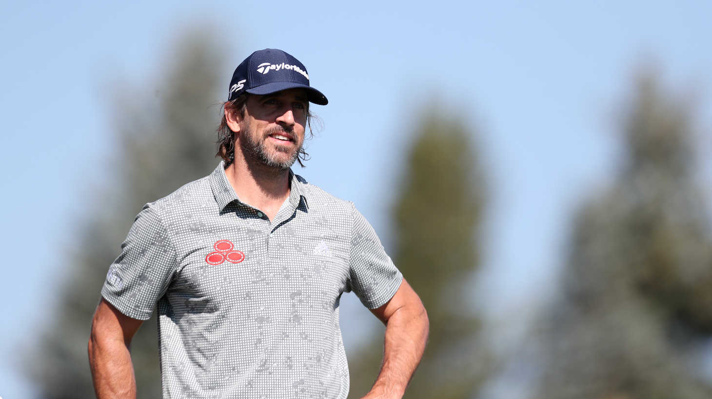 SOUTH LAKE TAHOE, NEVADA - JULY 10: NFL athlete Aaron Rodgers looks on from the first hole during round two of the American Century Championship at Edgewood Tahoe South golf course on July 10, 2020 in South Lake Tahoe, Nevada. (Photo by Jed Jacobsohn/Getty Images)