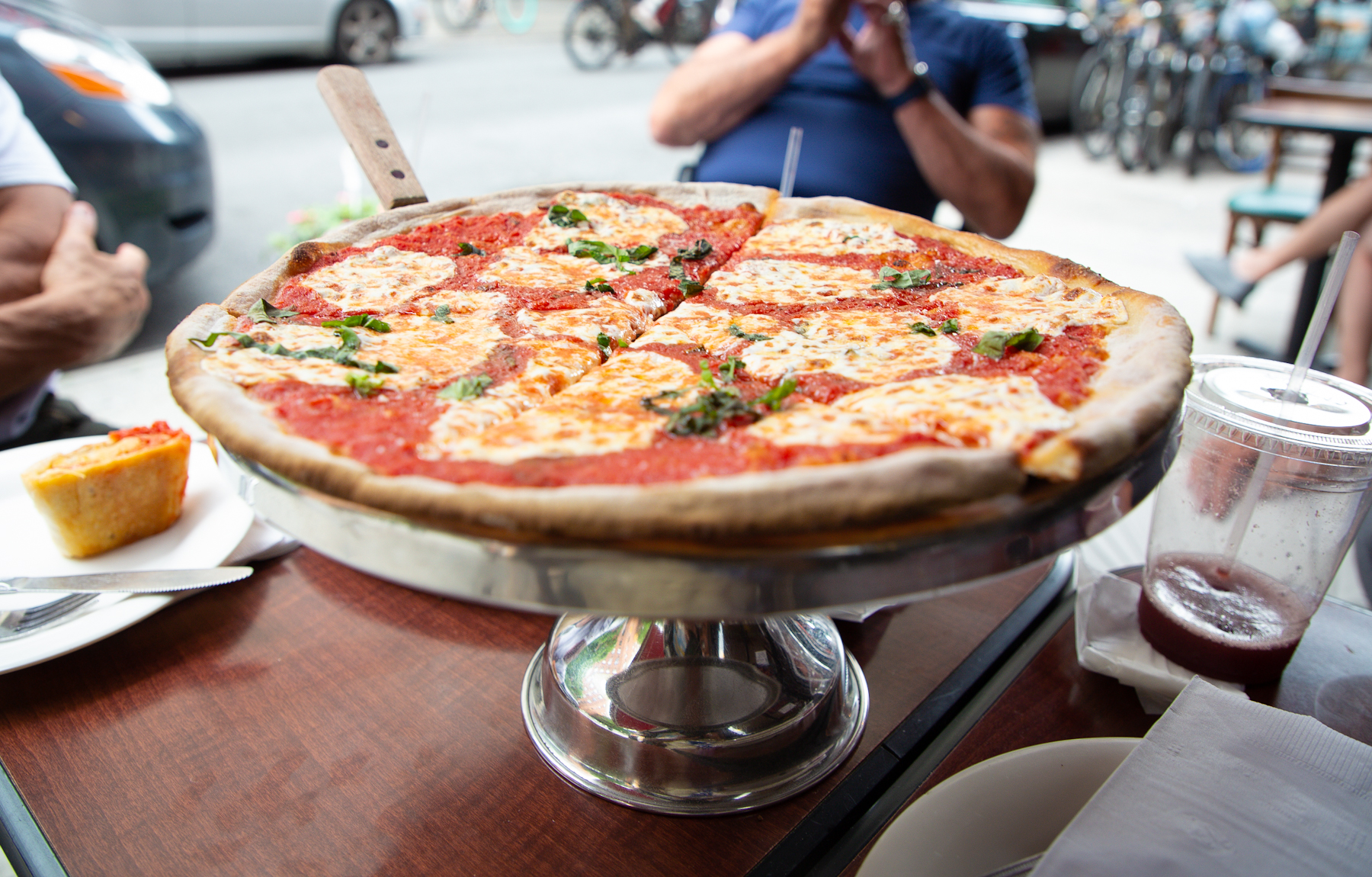 A Margherita pie is served at the famous Lombardi's Pizza amid the COVID-19 pandemic on July 07, 2020 in New York, New York.