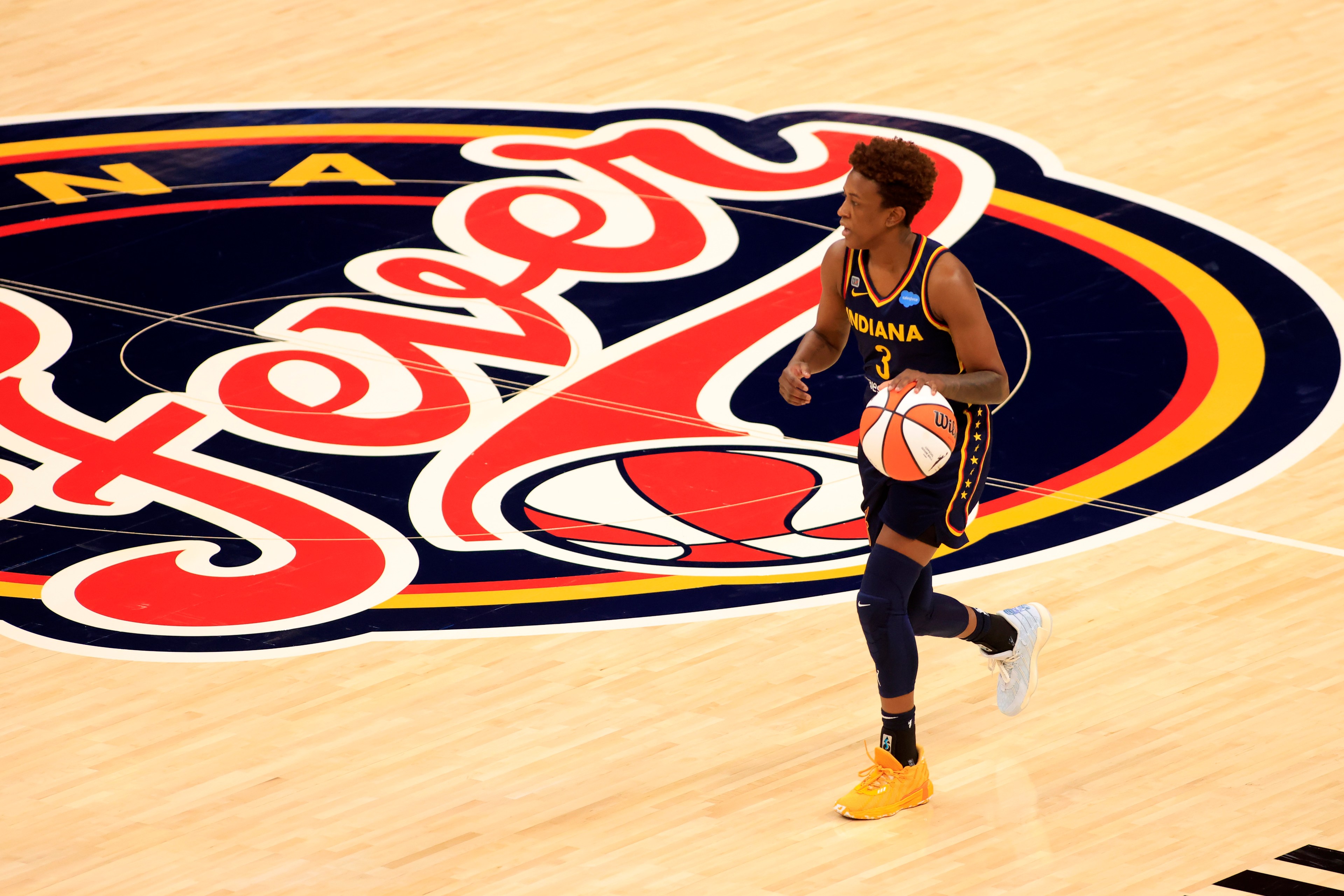 Danielle Robinson #3 of the Indiana Fever brings the ball up the court in the game against the New York Liberty at Bankers Life Fieldhouse on May 16, 2021 in Indianapolis, Indiana.