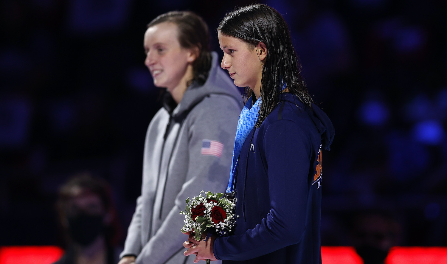 OMAHA, NEBRASKA - JUNE 19: Katie Ledecky and Katie Grimes react during the Women’s 800m freestyle medal ceremony during Day Seven of the 2021 U.S. Olympic Team Swimming Trials at CHI Health Center on June 19, 2021 in Omaha, Nebraska. (Photo by Maddie Meyer/Getty Images)
