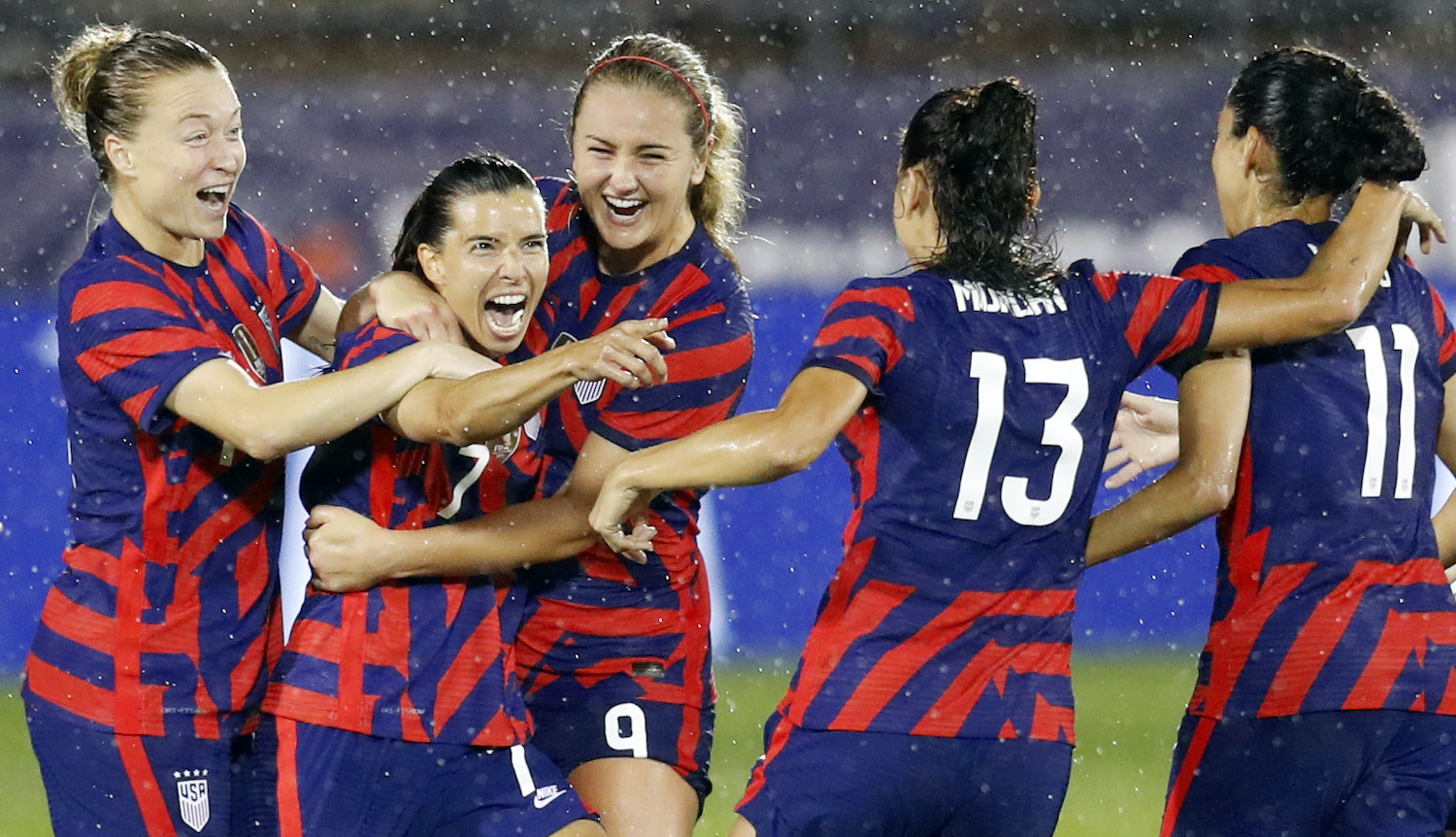 EAST HARTFORD, CONNECTICUT - JULY 01: Tobin Heath #7 of United States celebrates with Christen Press #11, Alex Morgan #13, Lindsey Horan #9 and Emily Sonnett, #14 after scoring a goal against Mexico at Rentschler Field on July 01, 2021 in East Hartford, Connecticut. (Photo by Maddie Meyer/Getty Images)