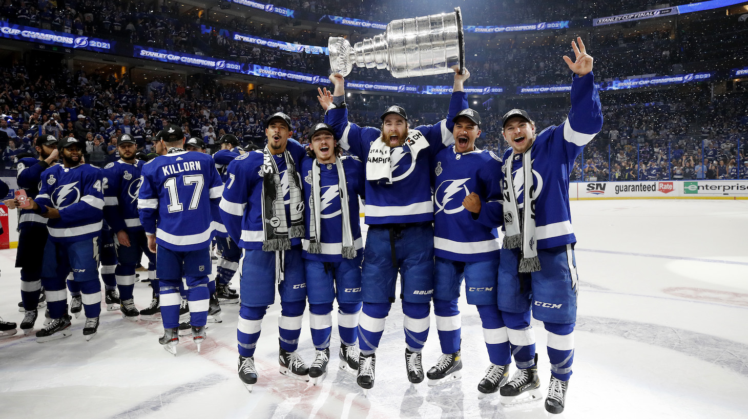 TAMPA, FLORIDA - JULY 07: The Tampa Bay Lightning celebrate after defeating the Montreal Canadiens 1-0 in Game Five to win the 2021 NHL Stanley Cup Final at Amalie Arena on July 07, 2021 in Tampa, Florida. (Photo by Bruce Bennett/Getty Images)